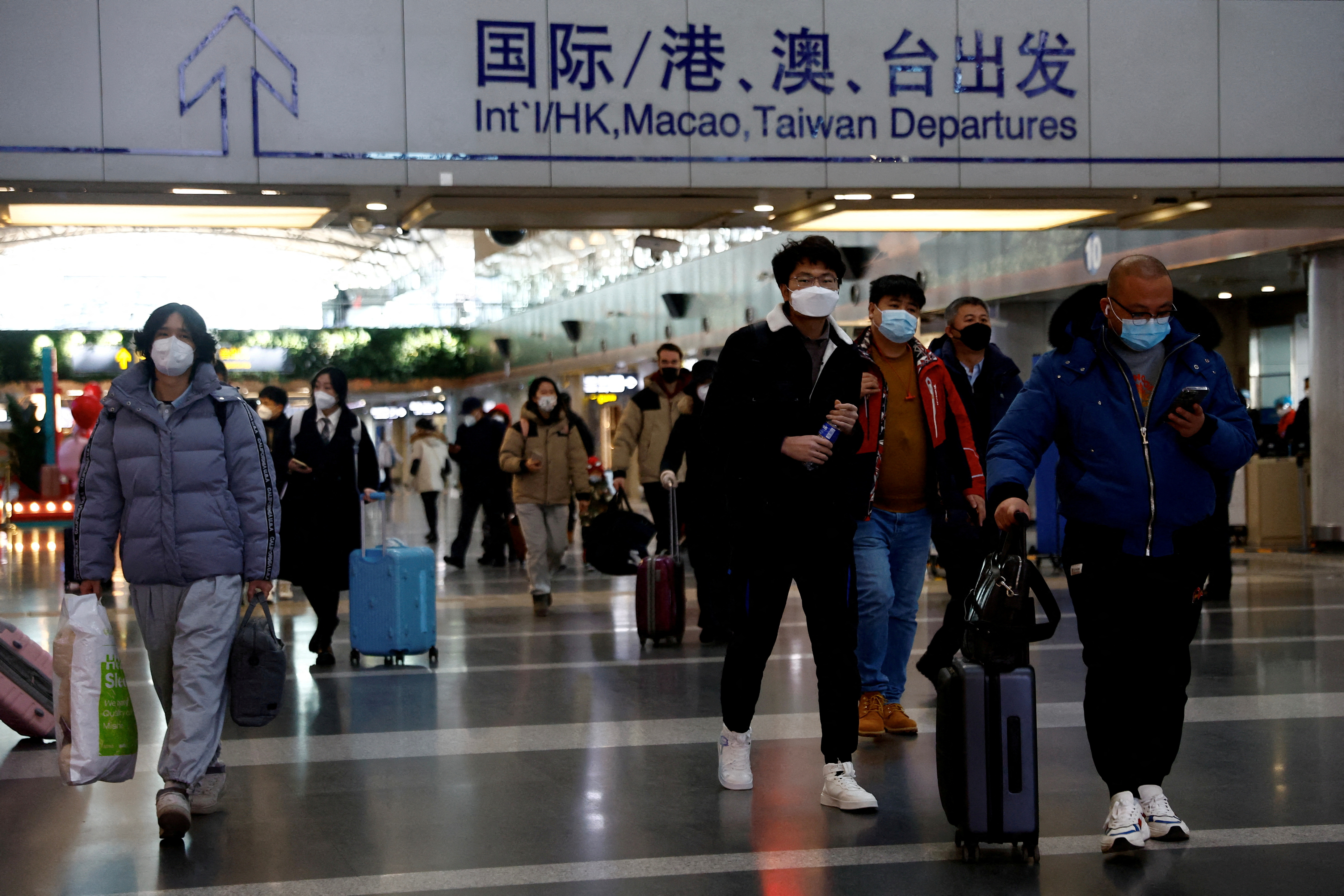 Viajeros en el aeropuerto Beijing Capital (Reuters)