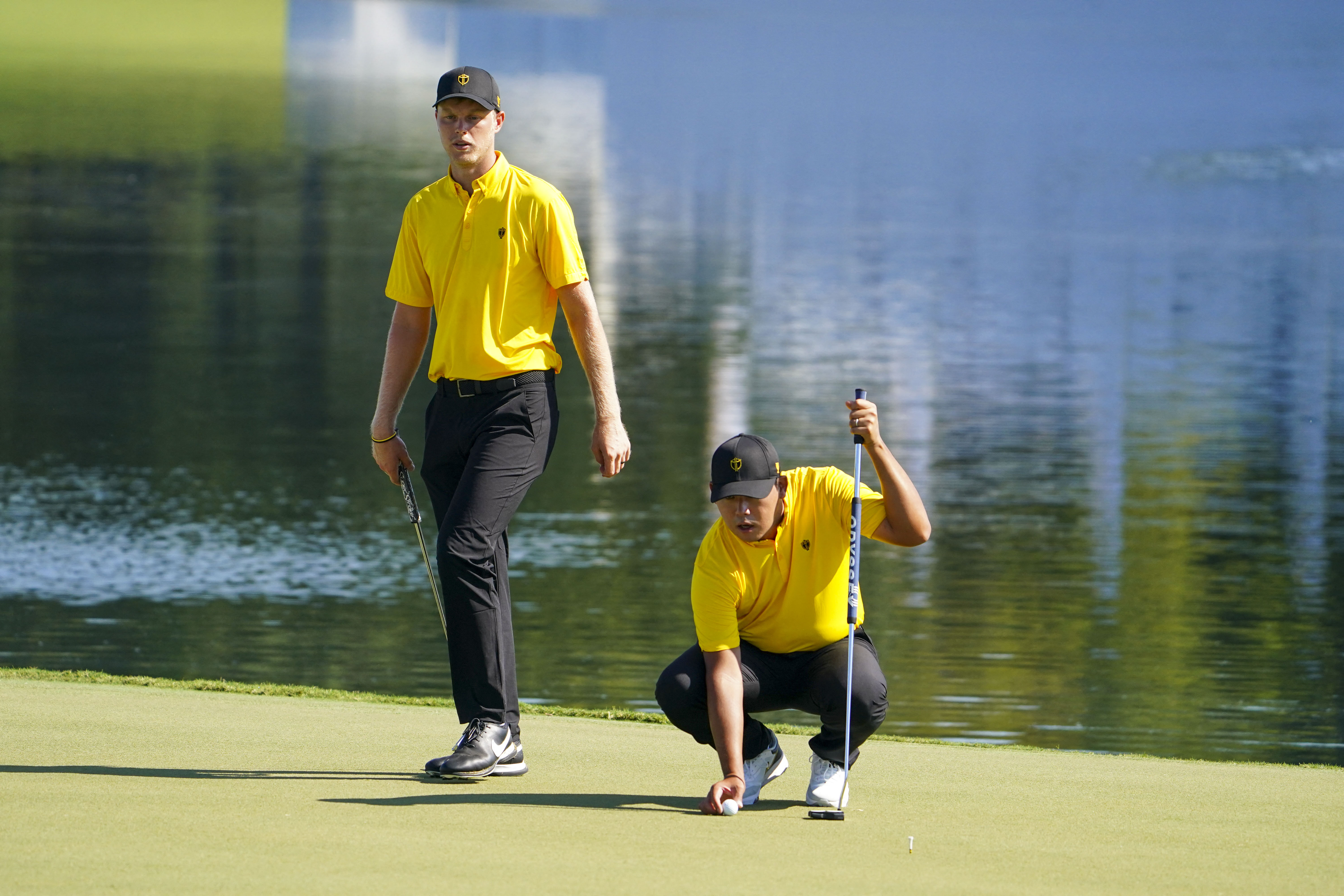 Cam Davis and Si Woo Kim training on practice day for the Presidents Cup