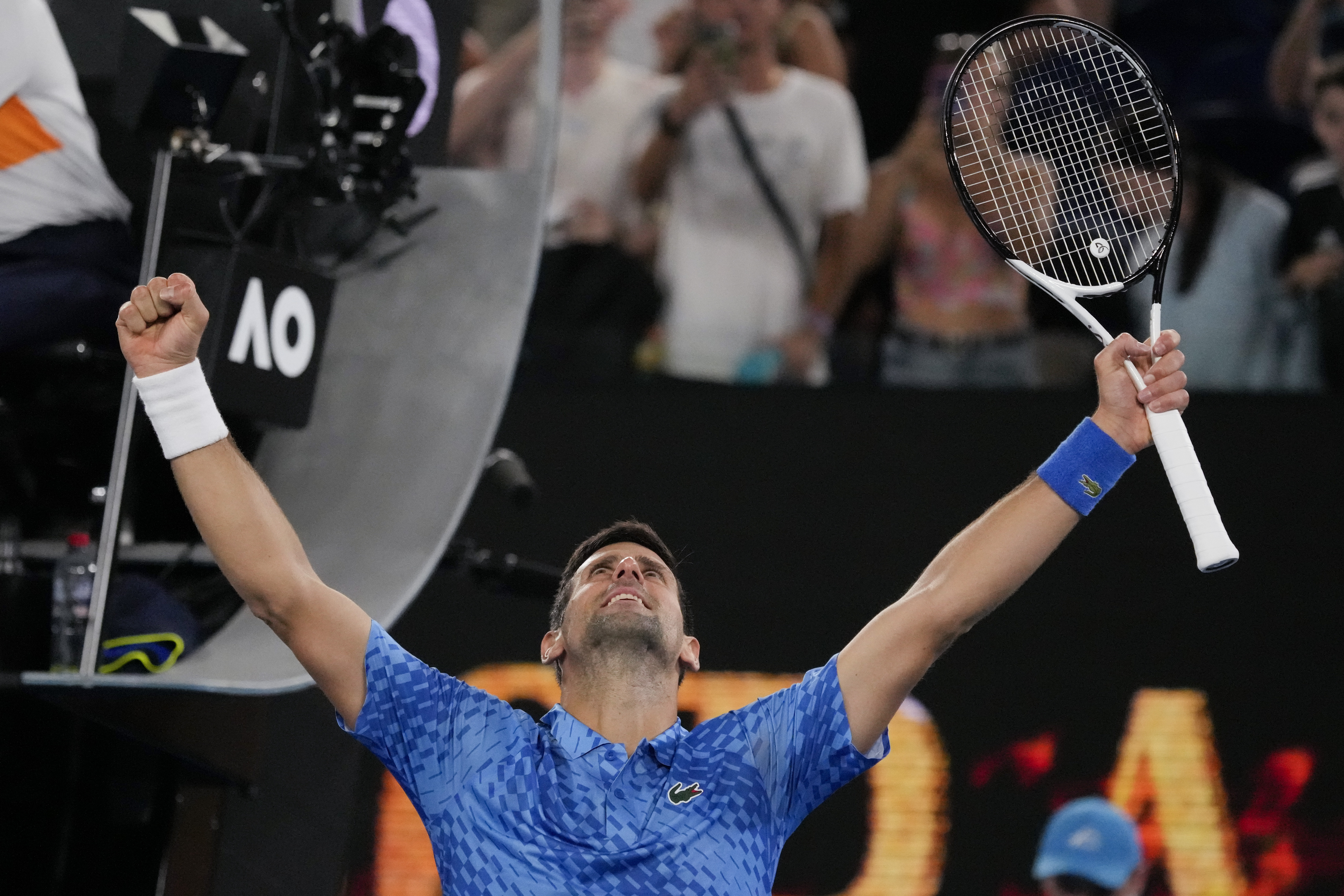 Novak Djokovic waves after beating Roberto Carballés Baena in the first round of the Australian Open, Wednesday, January 18, 2023, in Melbourne.  (AP Photo/Aaron Favila)