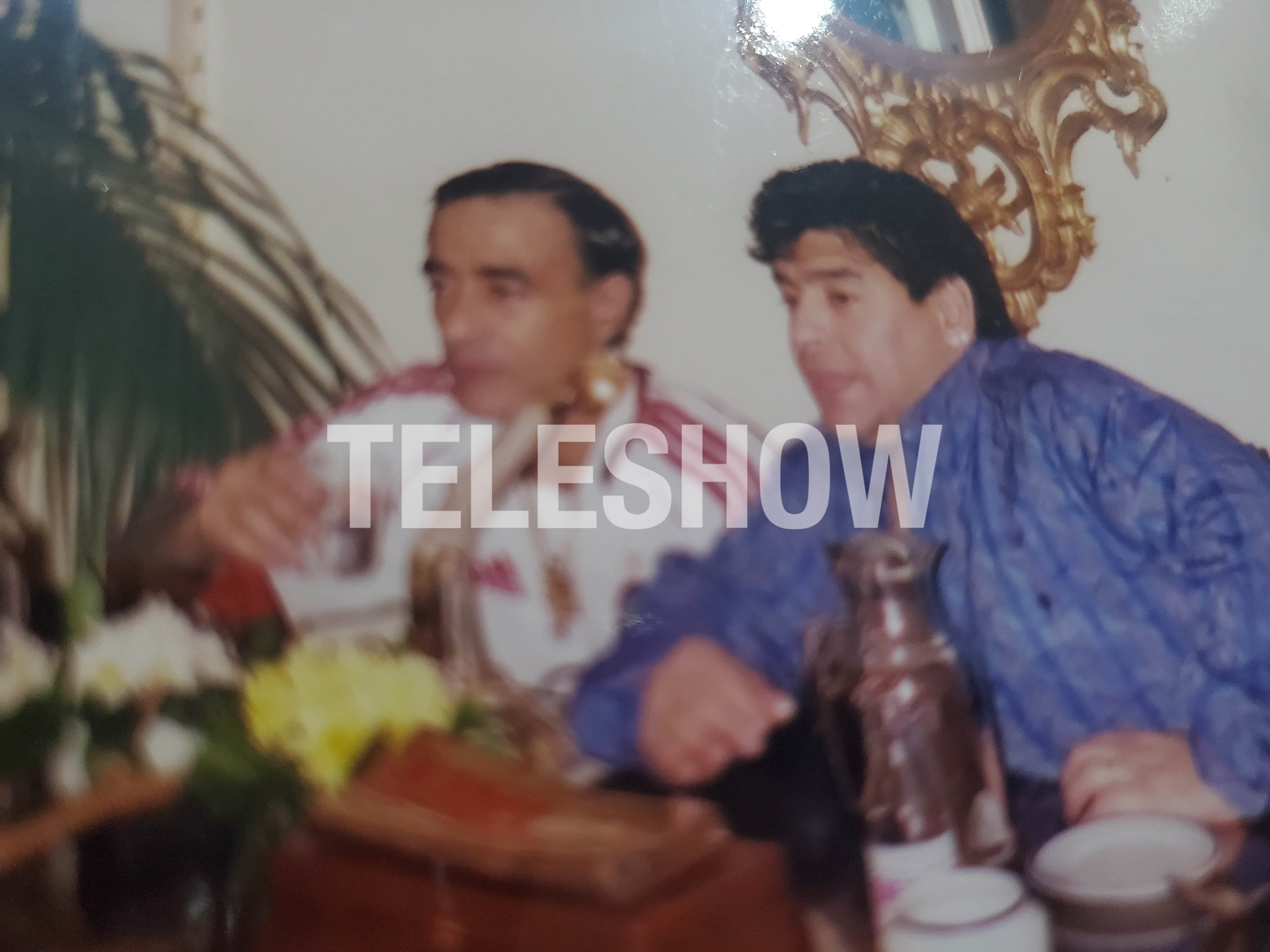 Carlos Ferro Viera y Diego Maradona en uno de sus viajes