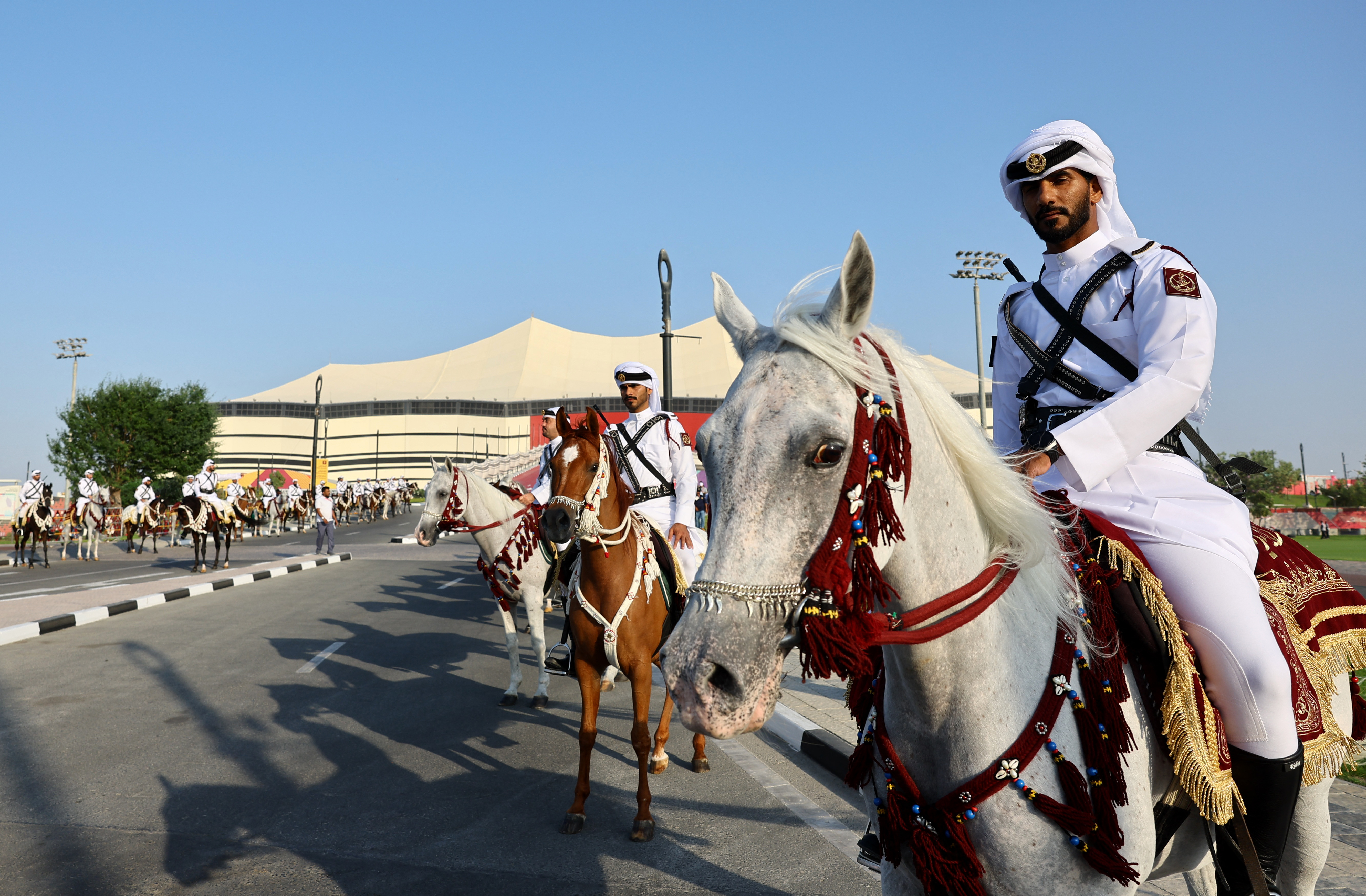 Soccer Football - FIFA World Cup Qatar 2022 - Group A - Qatar v Ecuador - Al Bayt Stadium, Al Khor, Qatar - November 20, 2022 Mounted police are pictured outside the stadium before the match REUTERS/Kai Pfaffenbach