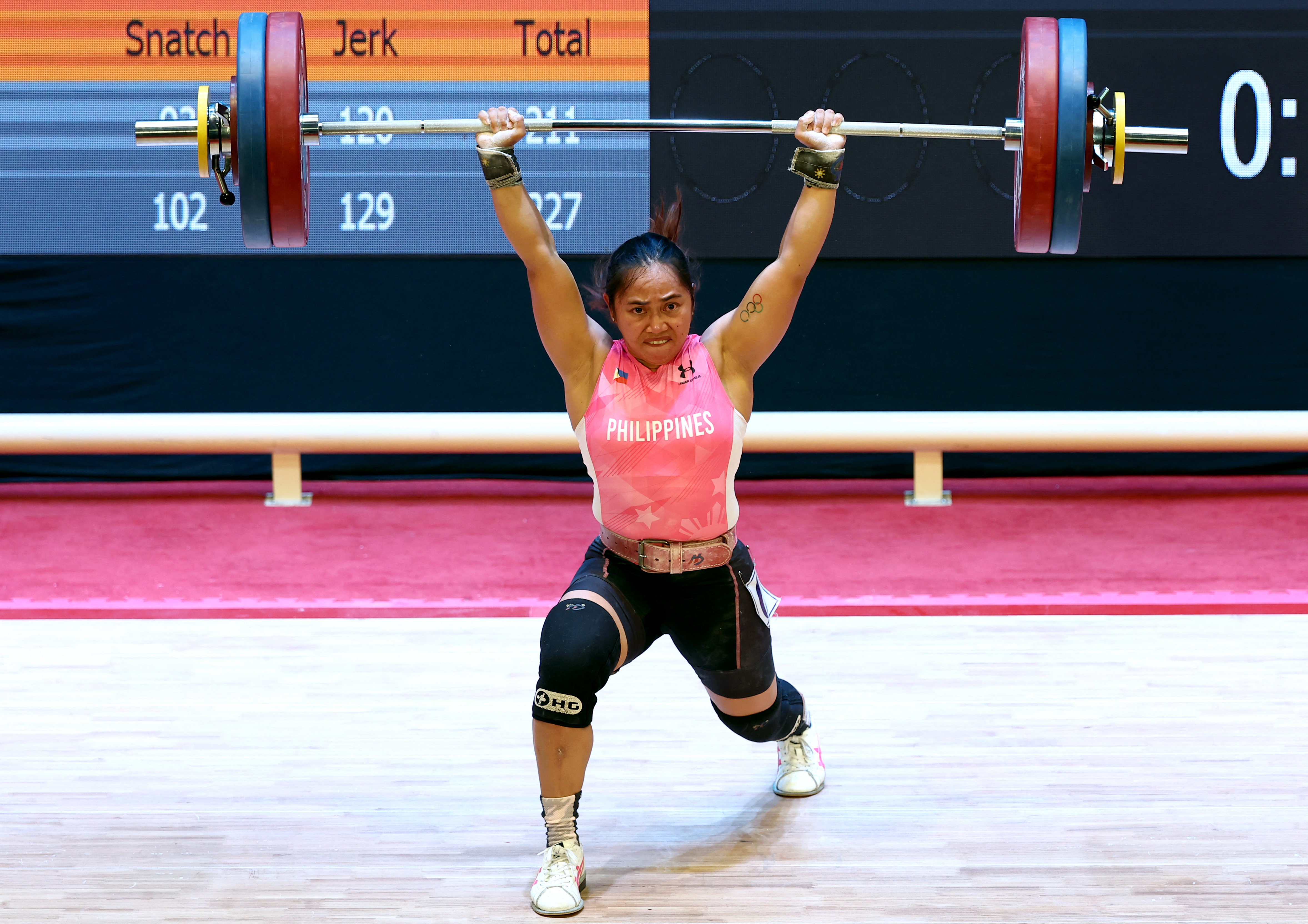 Southeast Asian Games - Weightlifting - Hanoi Sports Training and Competition Center, Hanoi, Vietnam - May 20, 2022 Philippines' Hidilyn Diaz in action during the women's 55kg REUTERS/Chalinee Thirasupa