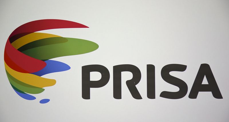 FILE PHOTO: Prisa's logo is displayed on a banner during its shareholders' meeting in Madrid, Spain, April 1, 2016. REUTERS/Andrea Comas