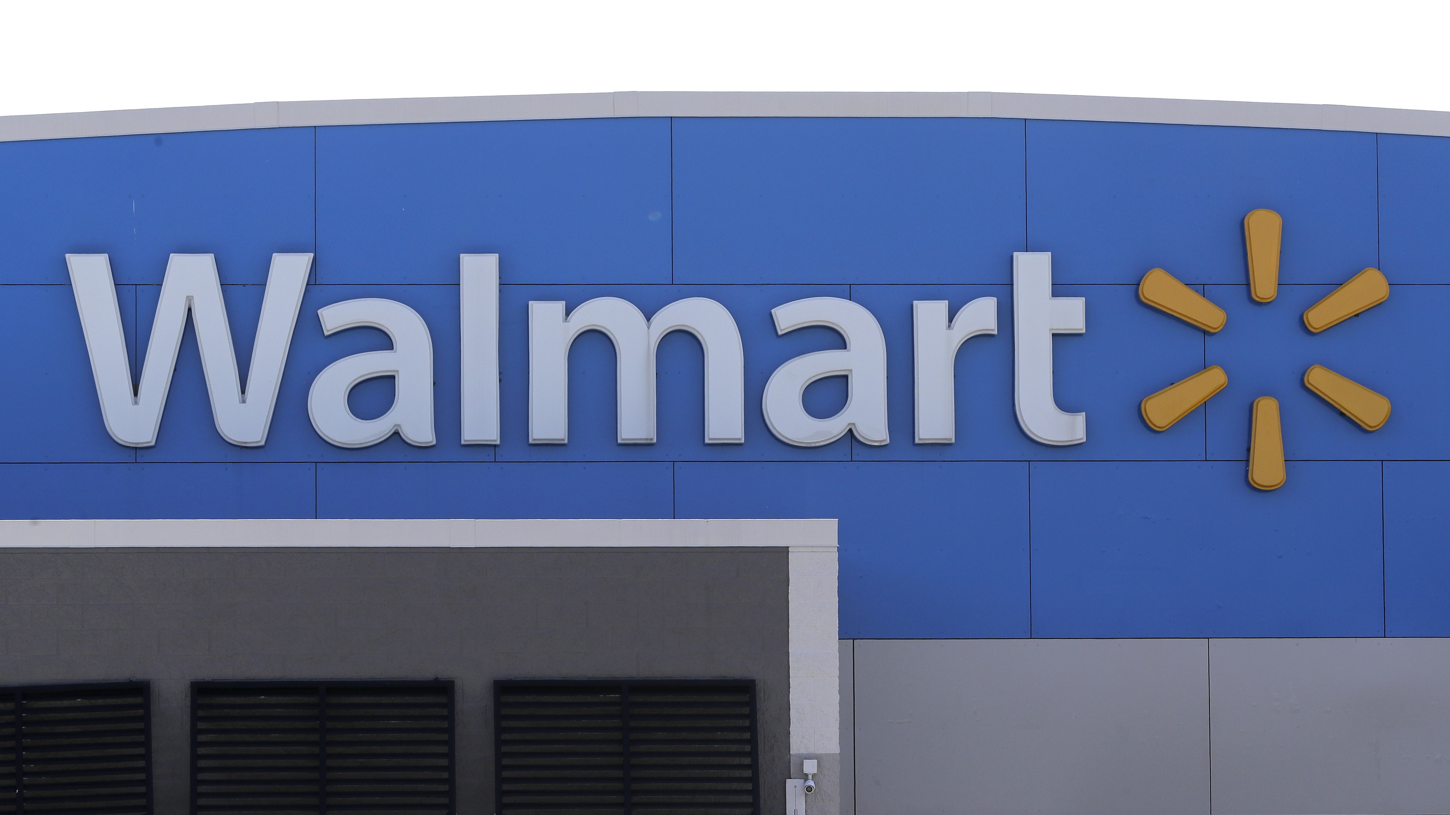 FILE - A Walmart logo is displayed at a Walmart store in Walpole, Mass., on Sept. 3, 2019. (AP Photo/Steven Senne, File)