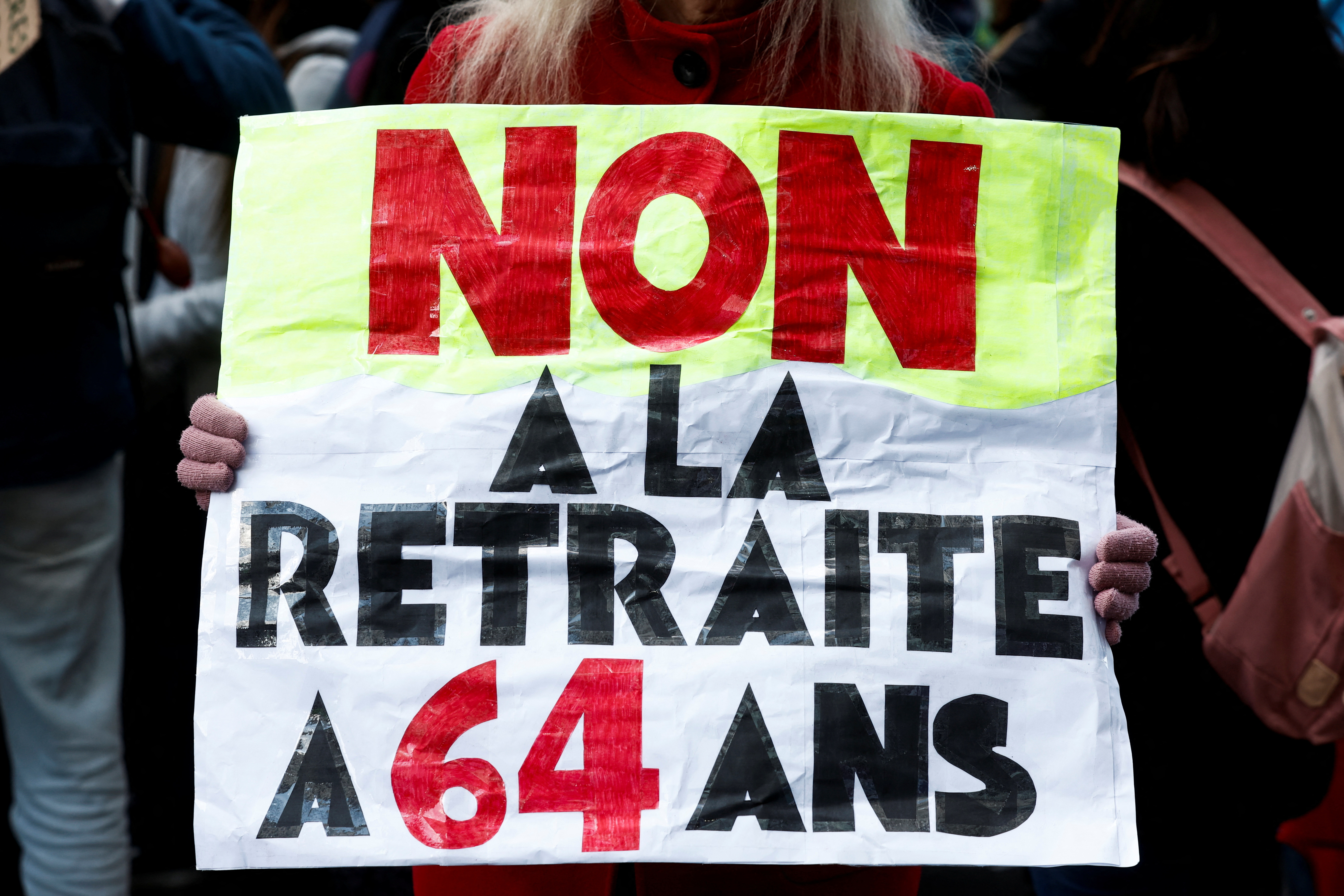 "No to retirement at 64 years old" (Reuters)