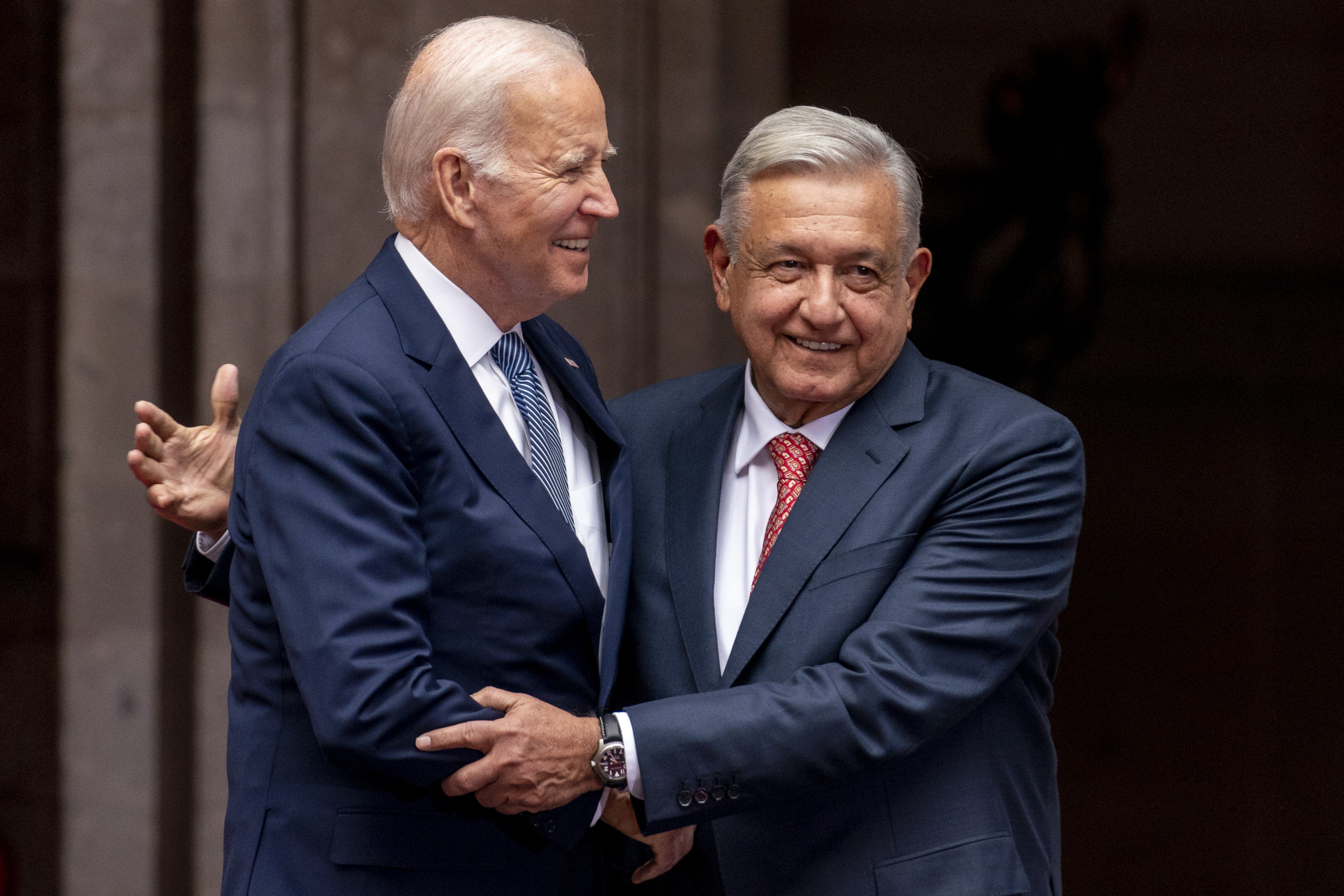 US President Joe Biden is greeted by Mexican President Andrés Manuel López Obrador upon his arrival at the National Palace in Mexico City, Mexico, Monday, Jan. 9, 2023. (AP Photo/Andrew Harnik)