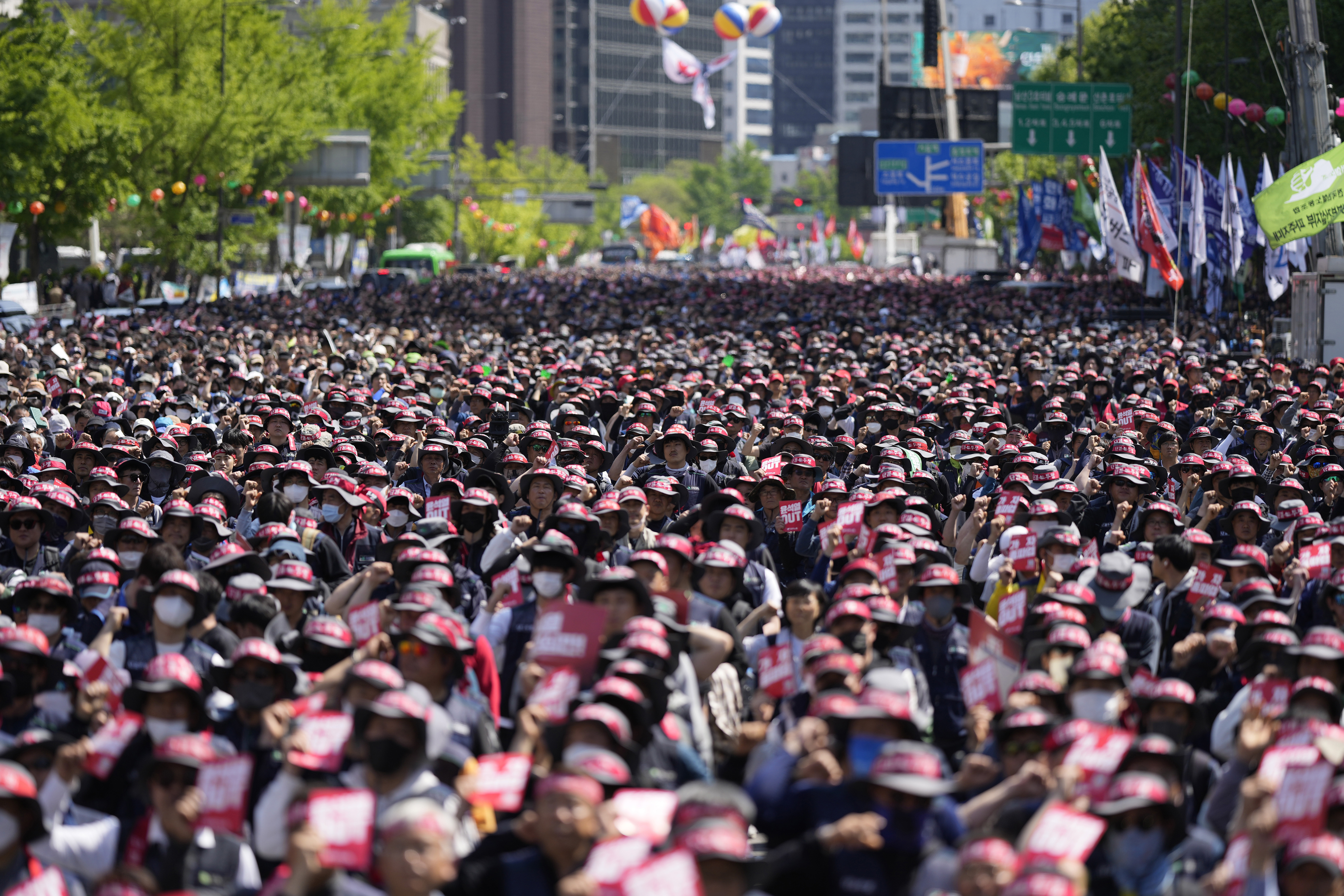 Members of the Korean Confederation of Trade Unions chant slogans during a May Day march in Seoul, South Korea, Monday, May 1, 2023. (AP Photo/Lee ​​Jin-man)