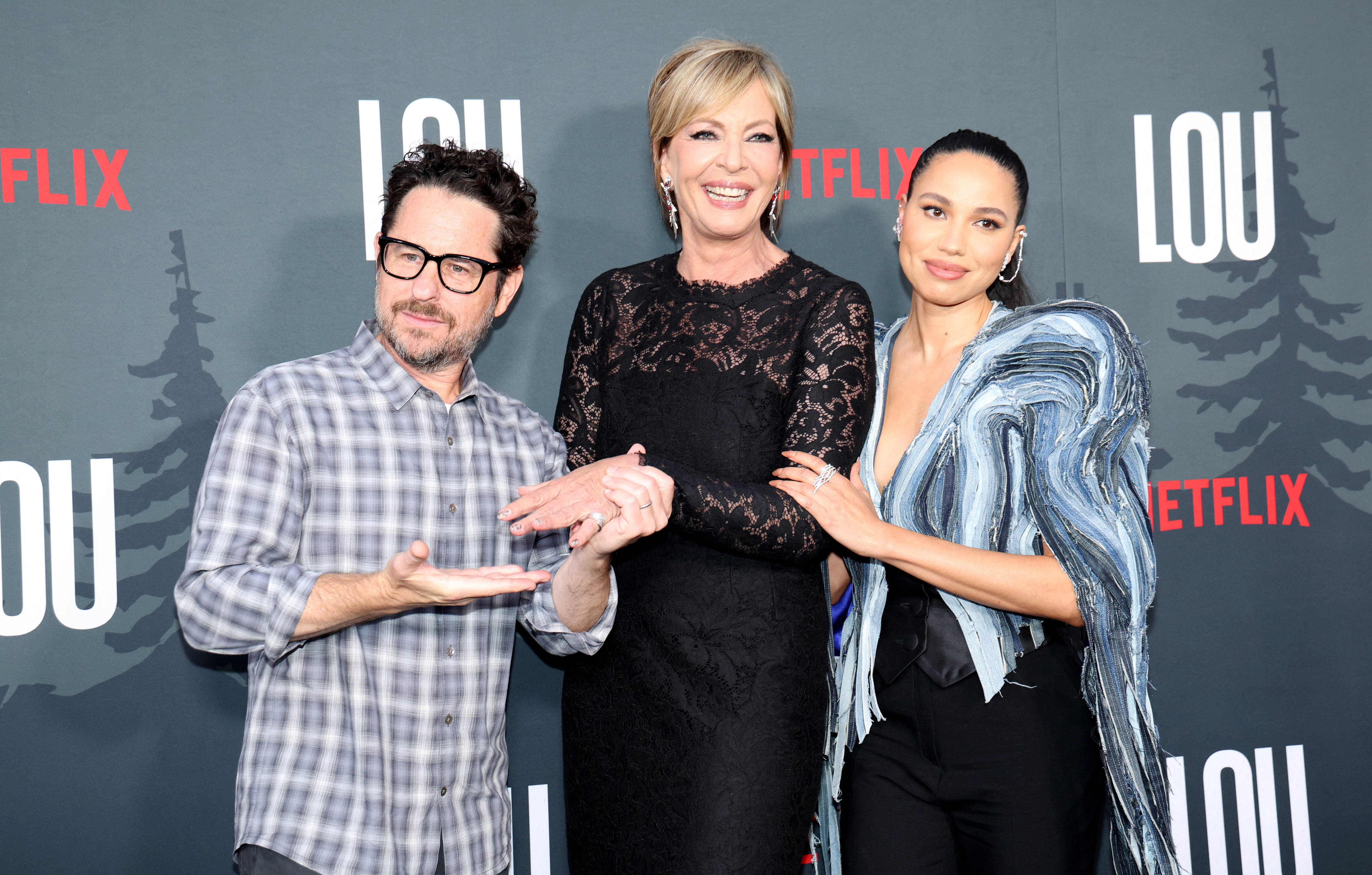Producer J.J. Abrams, cast members Allison Janney and Jurnee Smollett pose at a premiere for the film Lou in Los Angeles, California, U.S., September 15, 2022. REUTERS/Mario Anzuoni
