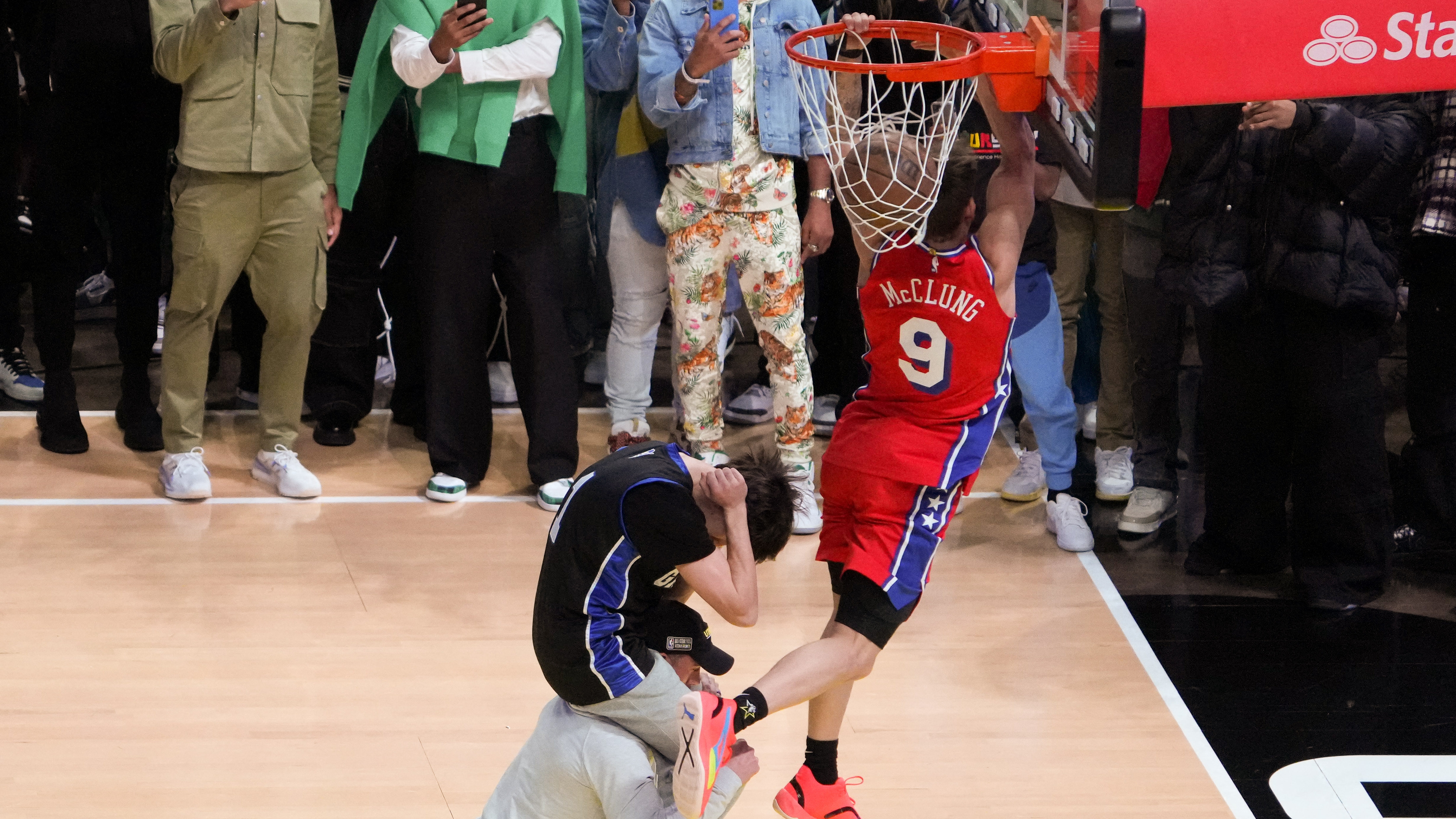 Feb 18, 2023; Salt Lake City, UT, USA; Philadelphia 76ers guard Mac McClung (9) dunks in the Dunk Contest during the 2023 All Star Saturday Night at Vivint Arena. Mandatory Credit: Kirby Lee-USA TODAY Sports