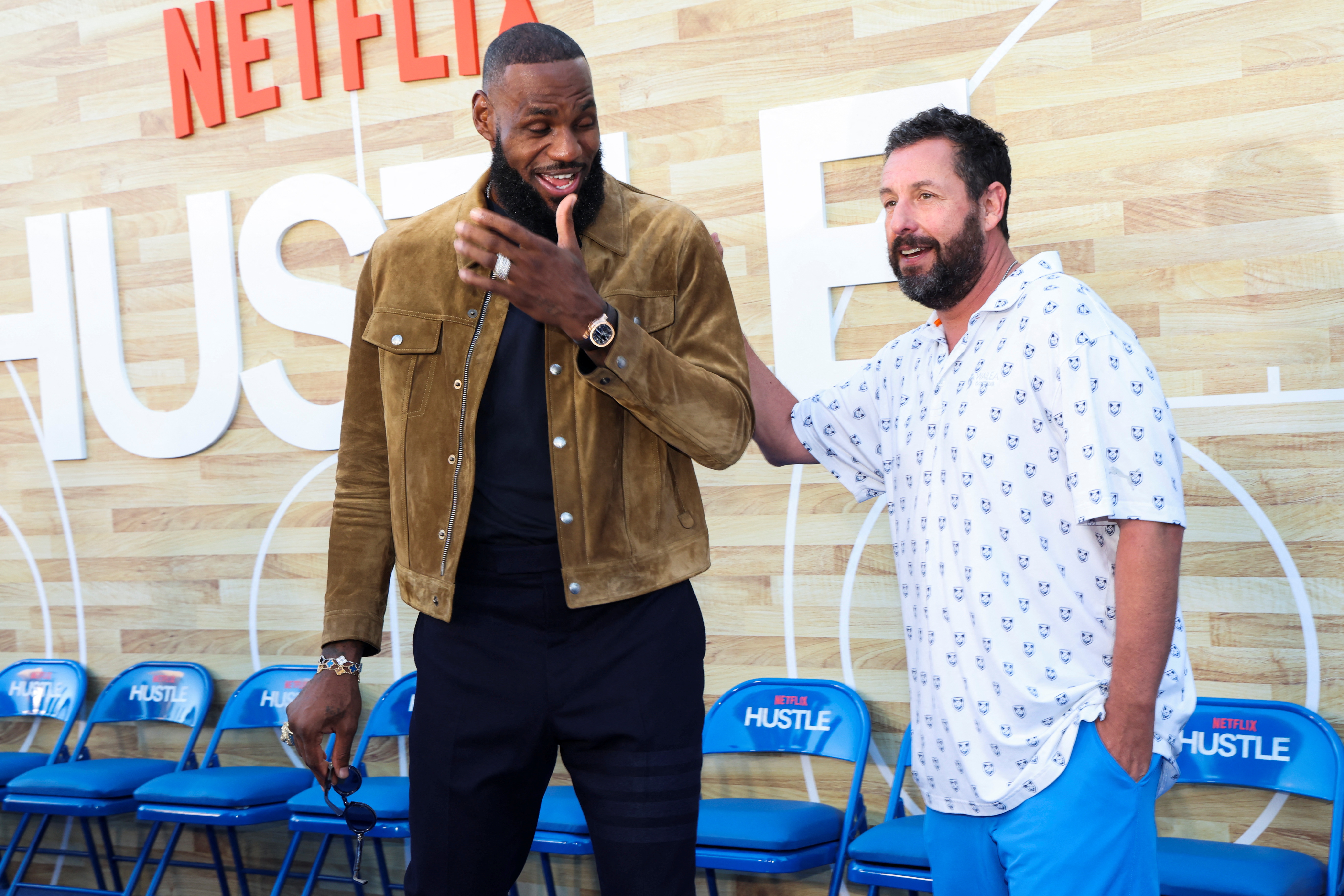 Cast members LeBron James and Adam Sandler attend a premiere for the film "Hustle" in Los Angeles, California, U.S., June 1, 2022. REUTERS/Mario Anzuoni