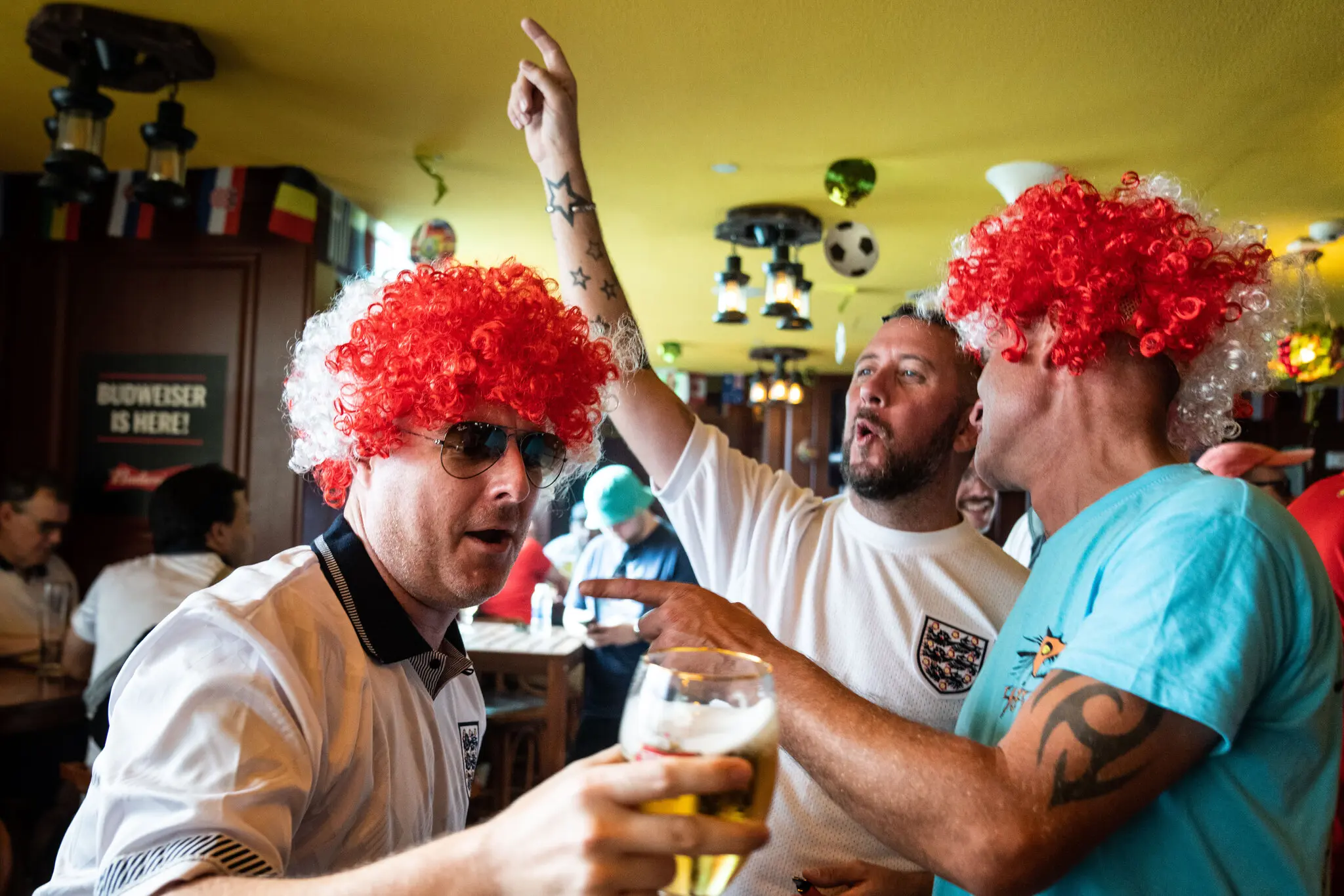 Beer and football are frequent companions, but never more than when it comes to the English (photos: Erin Schaff /New York Times)