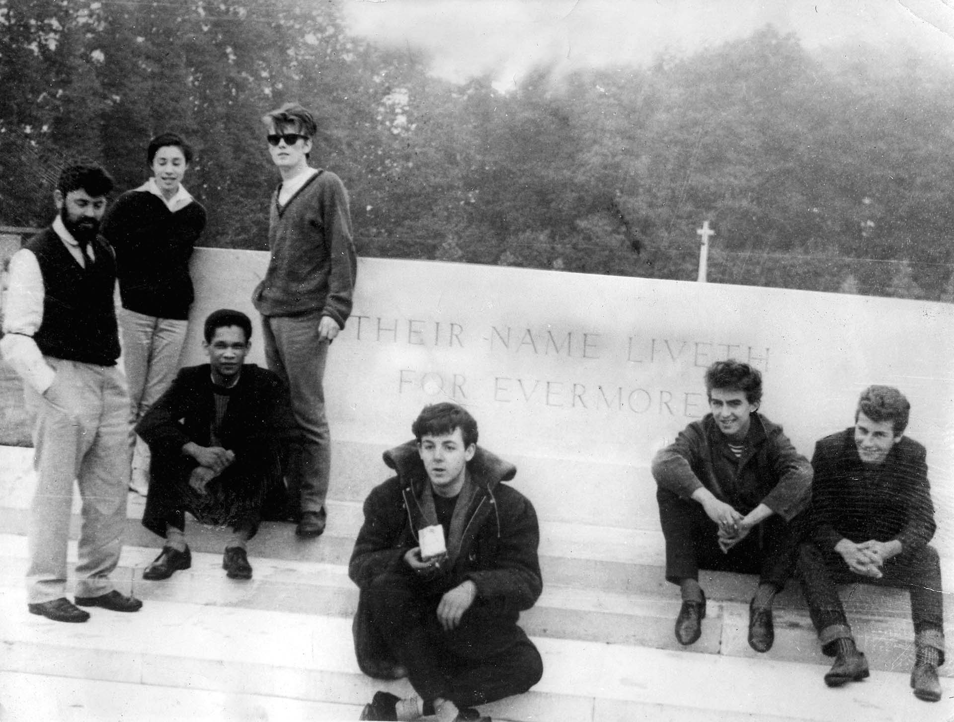 Mandatory Credit: Photo by Keystone/Shutterstock (439982aw)
Allan and Beryl Williams, Lord Woodbine, Stuart Sutcliffe, Paul Mccartney, George Harrison and Pete Best at the Arnhem War Memorial - 1961
The Beatles