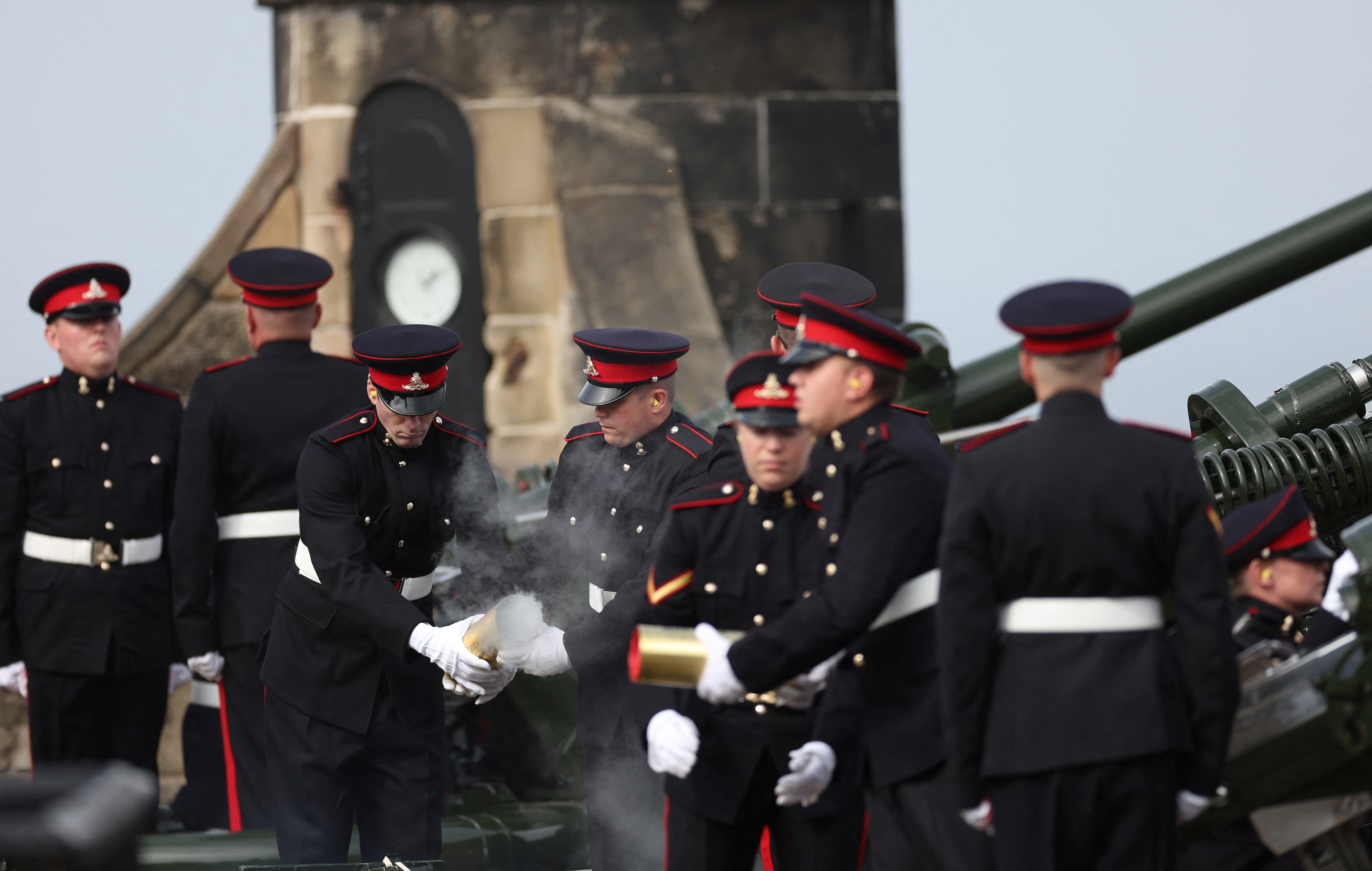96 cannon salvos were fired, one for each year of the Queen's reign (REUTERS/Carl Recine)