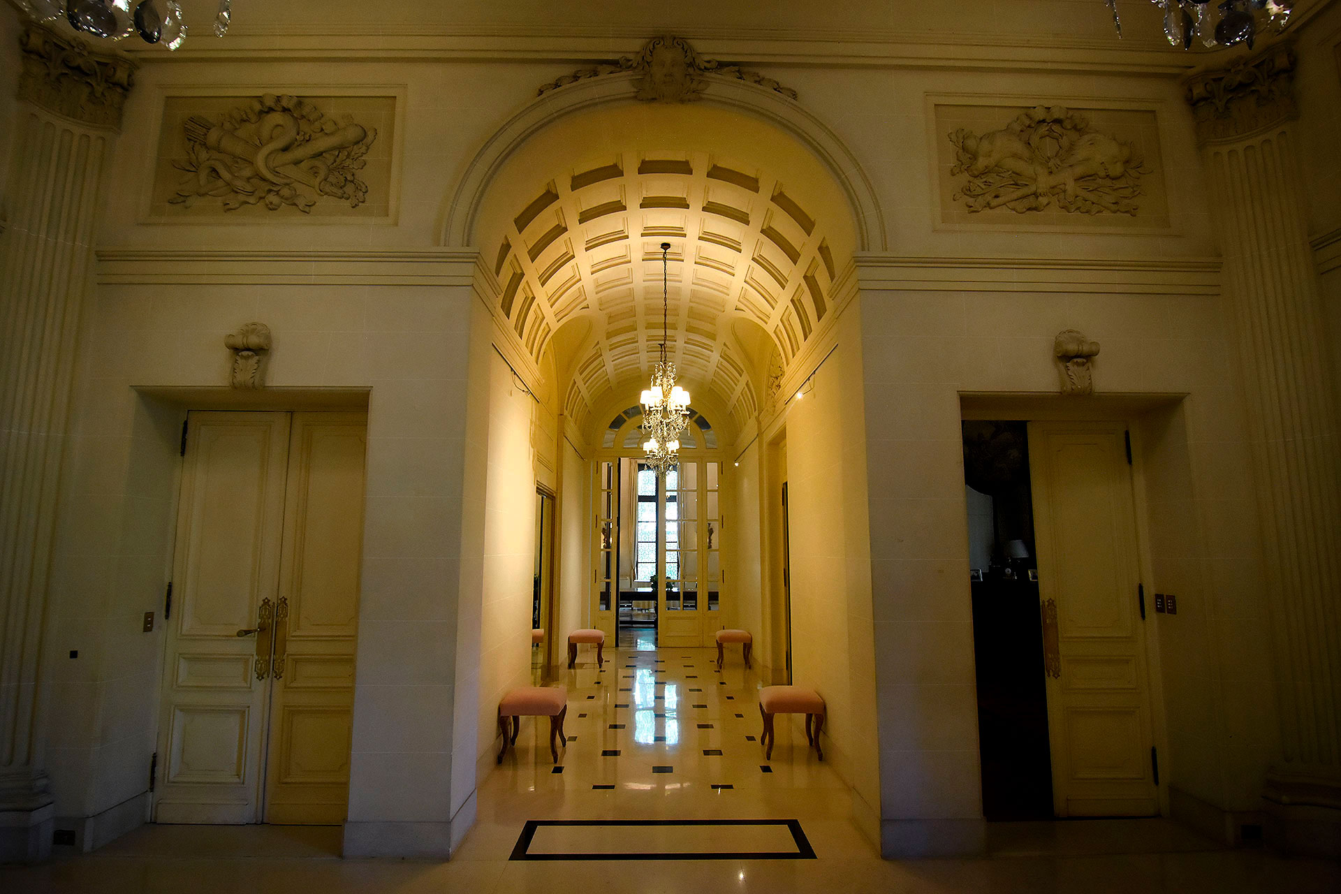 The decoration and furniture were all imported from Italy in 1924 and fit perfectly with the French style of the palace.  The only exception is the red armchair in the entrance hall that was donated after a recent exhibition of Italian design at the National Museum of Decorative Art (Nicolas Stulberg)