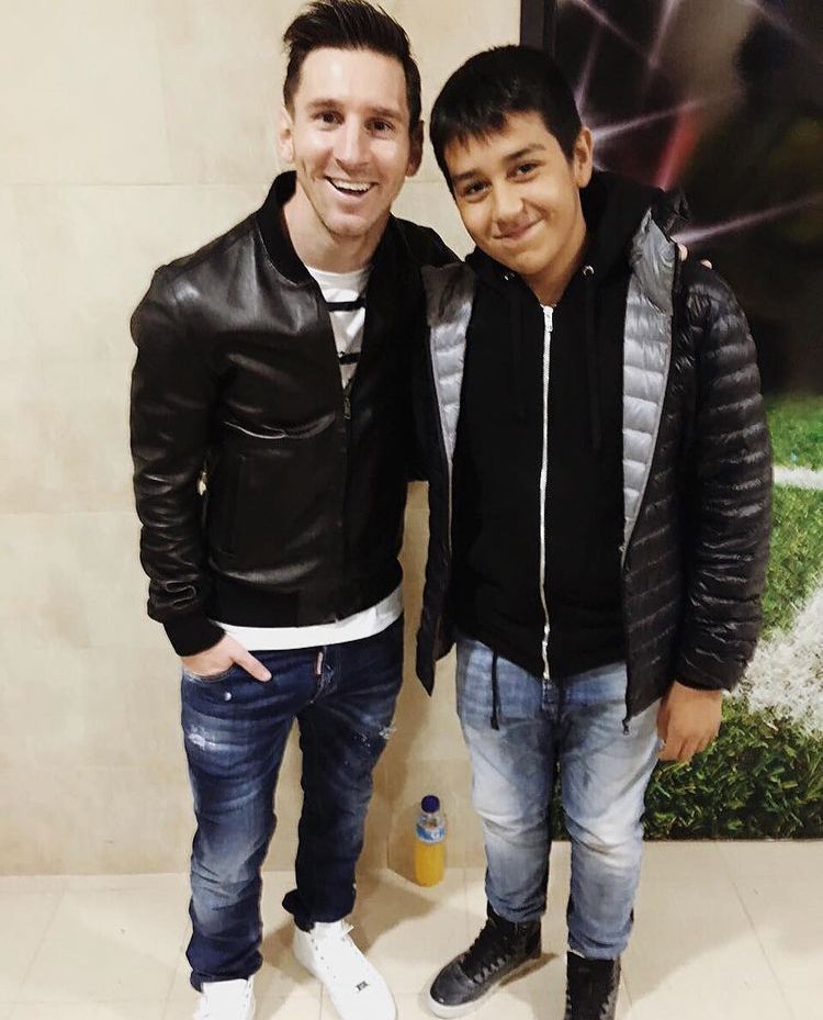 Lionel Messi y Agustín Riquelme, hijo de Román, hace algunos años