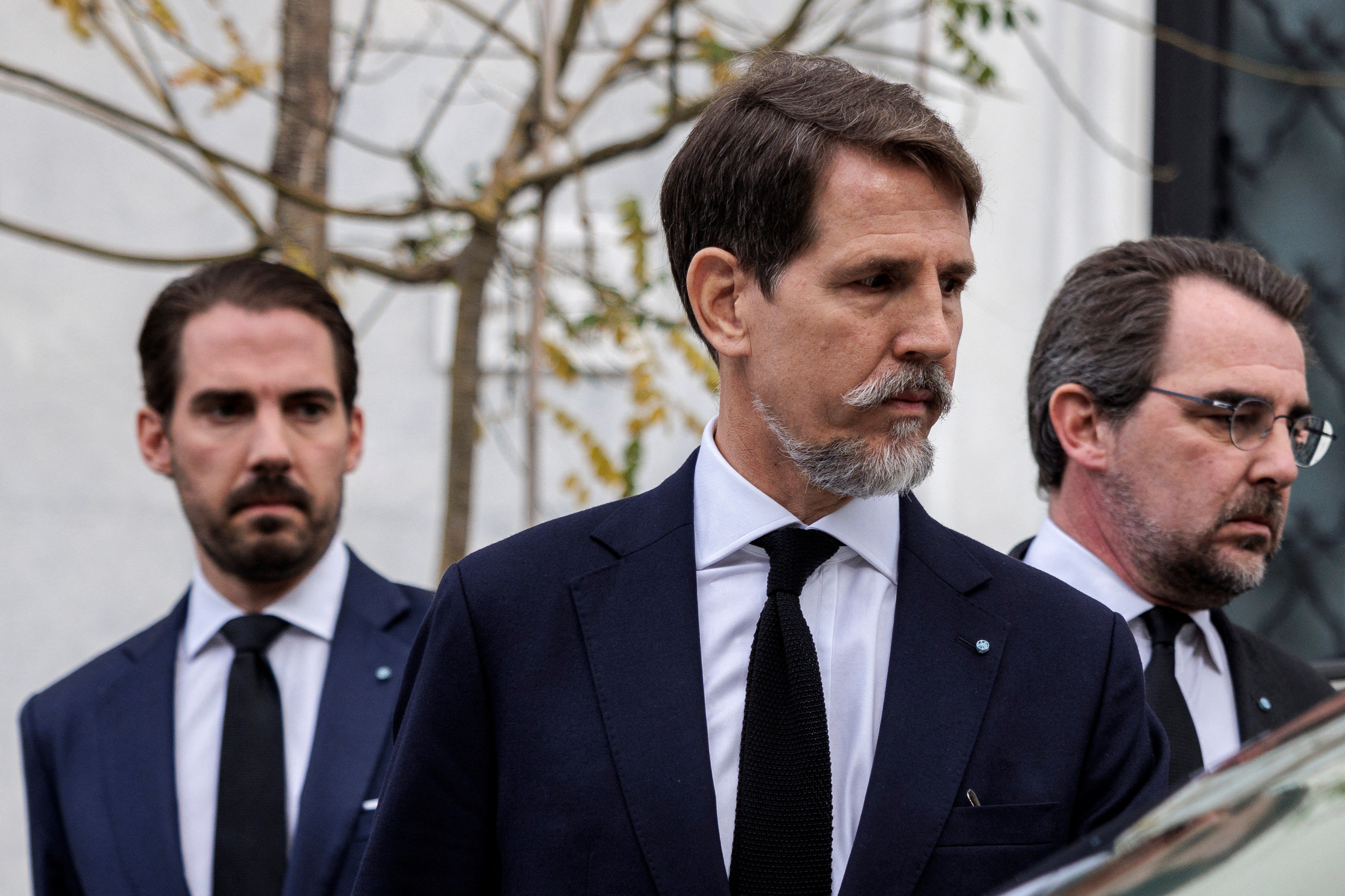 The sons of former King Constantine II of Greece, Crown Prince Pavlos, Prince Nikolaos and Prince Philippos leave the Maximos Mansion following a meeting with members of the Greek government.  REUTERS/Alkis Konstantinidis