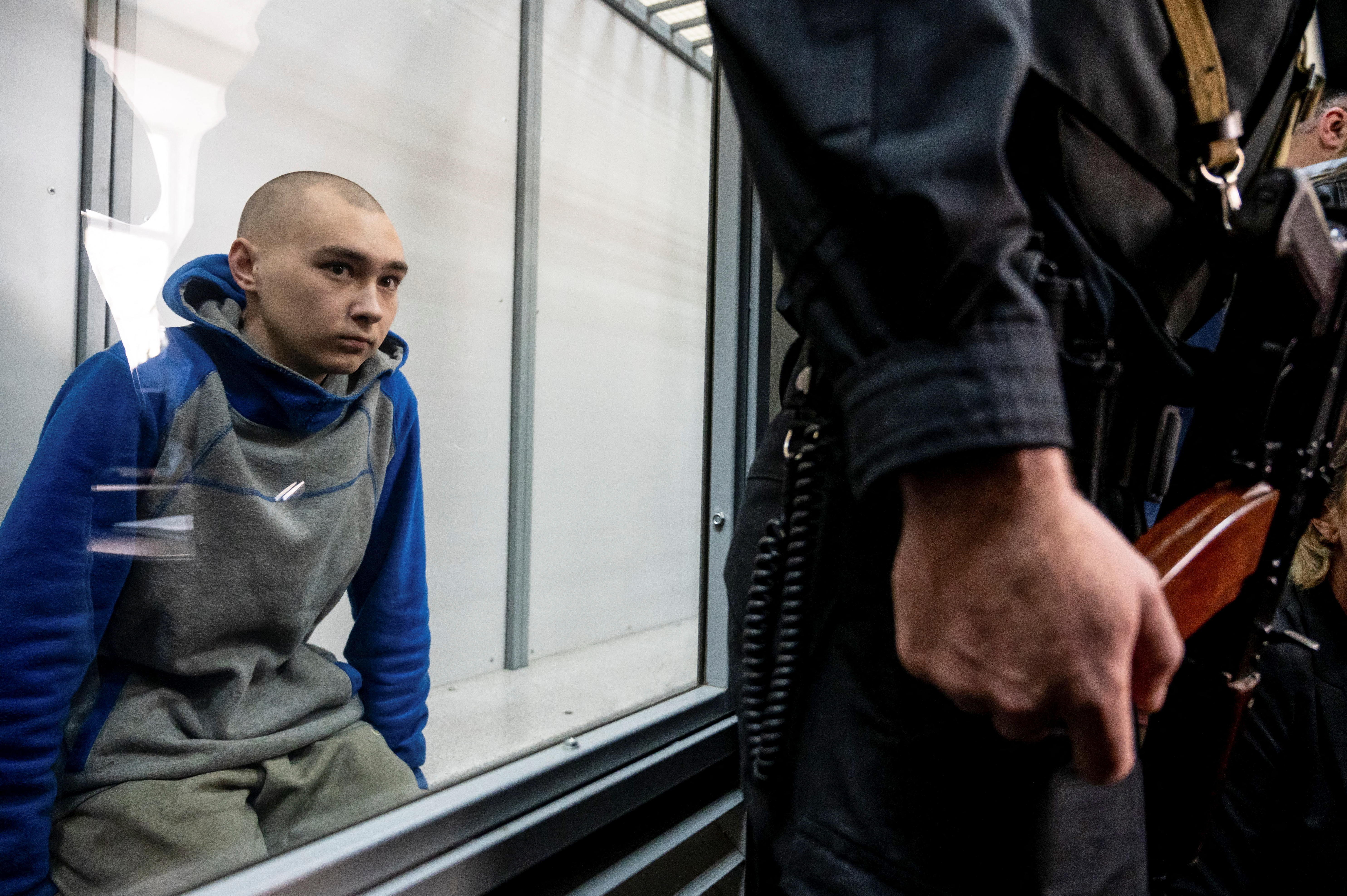 Vadim Shishimir, 21, sitzt bereits vor Gericht, um festzustellen, ob Wladimir Putin während der Invasion in der Ukraine Kriegsverbrechen begangen hat (Reuters)