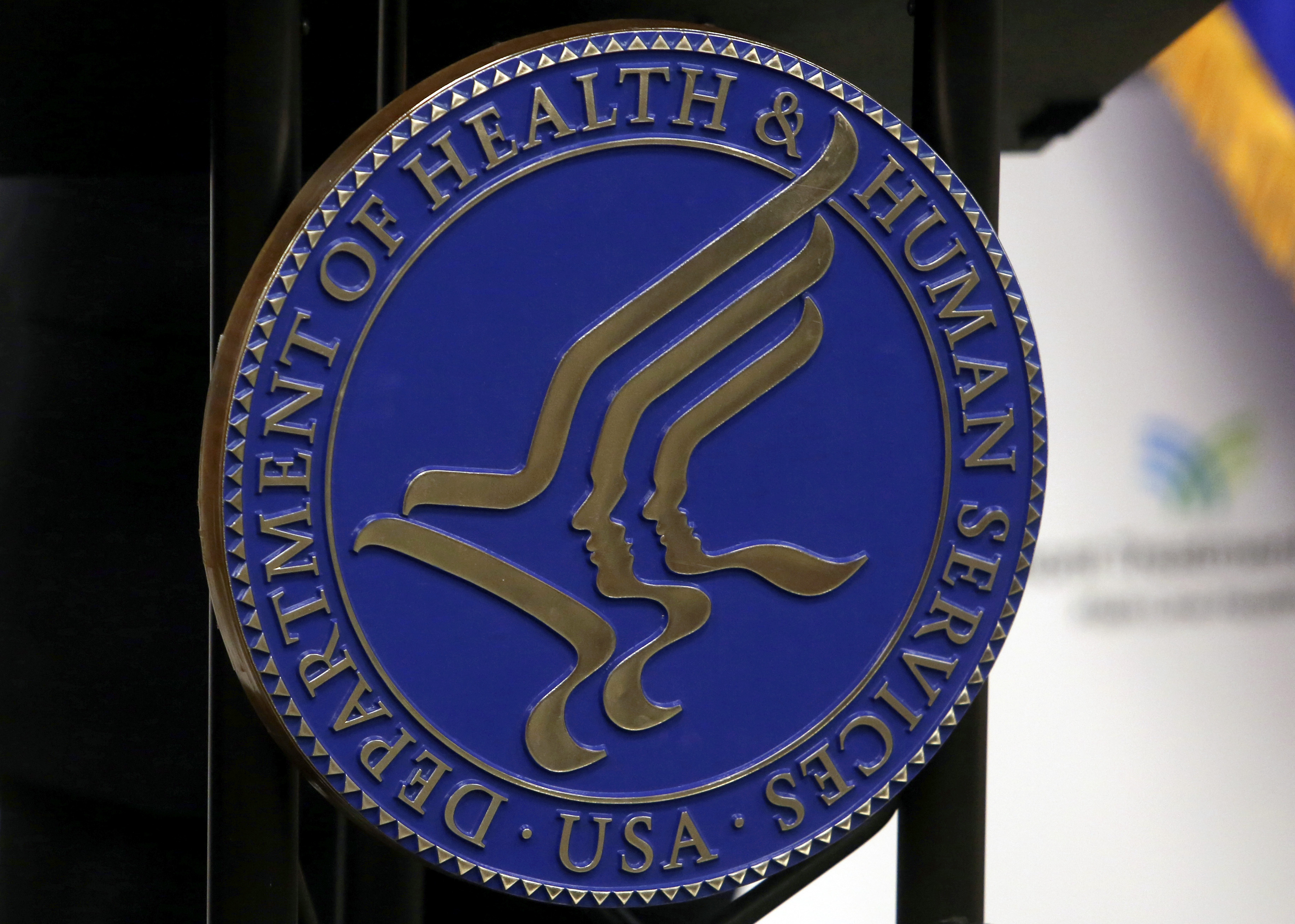 FILE - A U.S. Department of Health and Human Services (HHS) seal is affixed to a building in Media, Pennsylvania, on Sept. 15, 2017. (AP Photo/Jacqueline Larma, File)