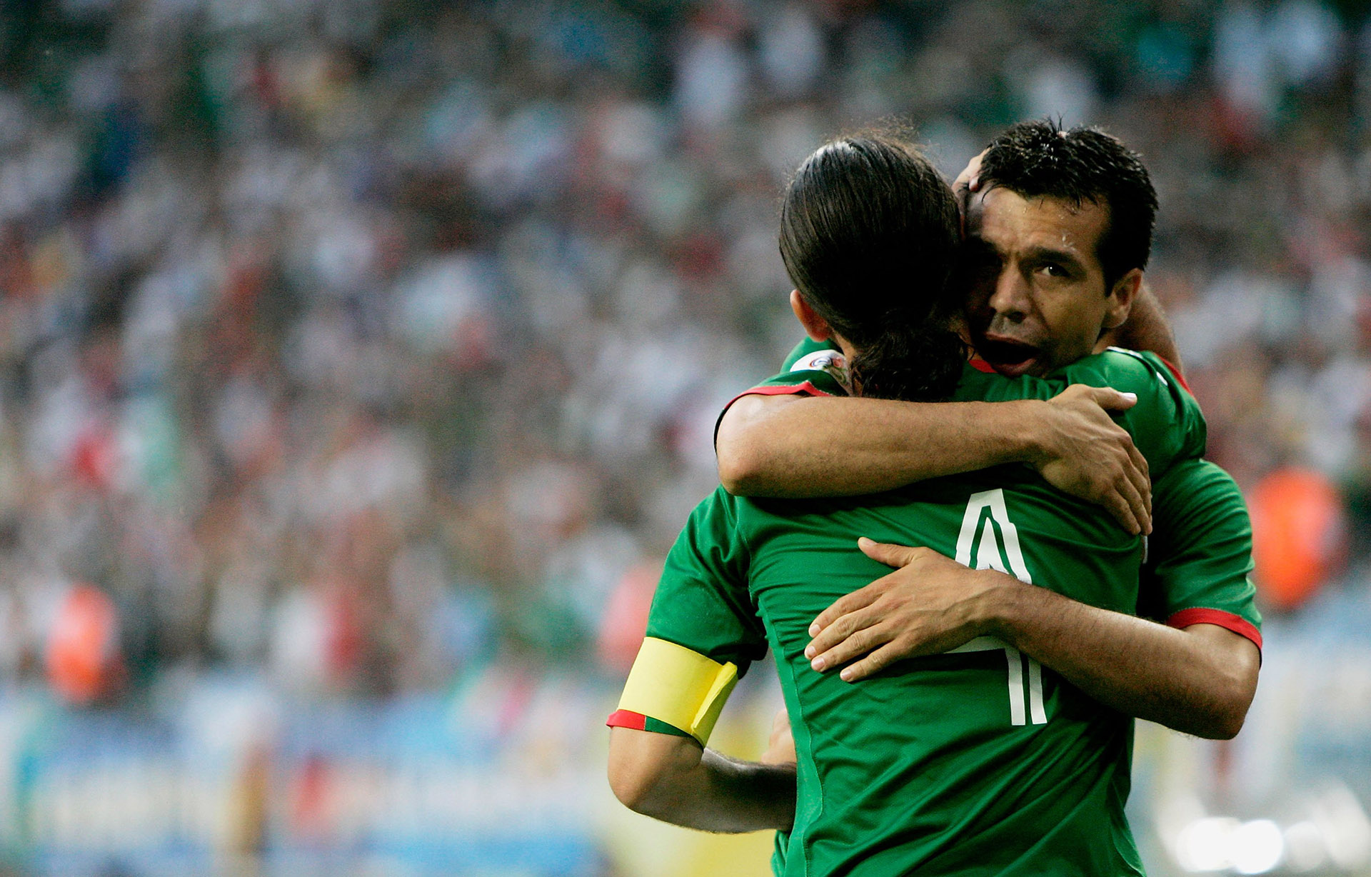 LEIPZIG, GERMANY - JUNE 24: Rafael Marquez (L) of Mexico is congratulated by team mate Jared Borgetti after scoring the opening goal during the FIFA World Cup Germany 2006 Round of 16 match between Argentina and Mexico played at the Zentralstadion on June 24, 2006 in Leipzig, Germany. (Photo by Christof Koepsel/Bongarts/Getty Images)