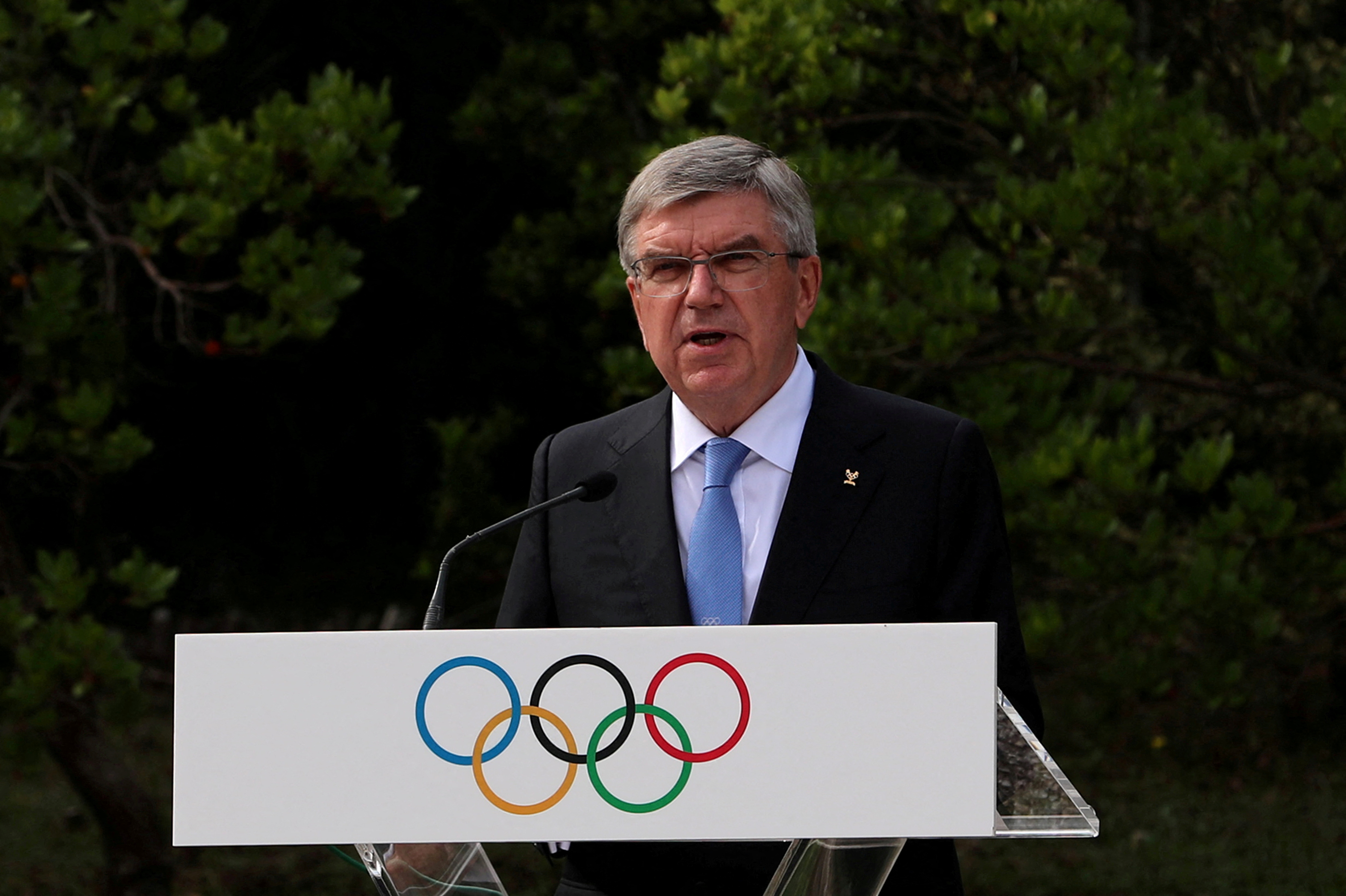 FILE PHOTO: President of the International Olympic Committee (IOC) Thomas Bach delivers a speech during a ceremony for the 100-year anniversary of the creation of the IOC Executive Board, in Ancient Olympia, Greece, October 17, 2021. REUTERS/Costas Baltas/File Photo/File Photo