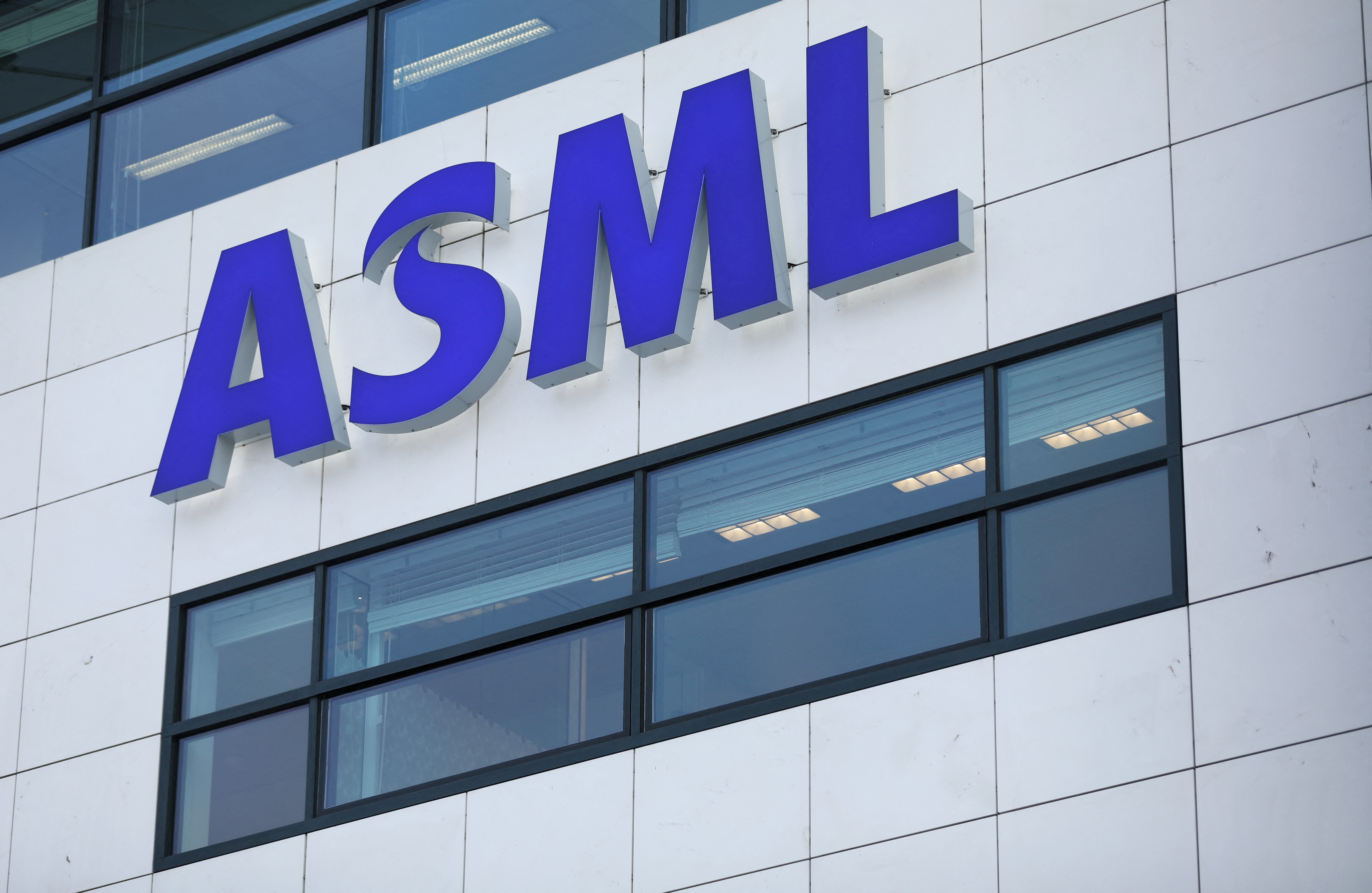 The ASML Holding logo is seen at the company's headquarters in Eindhoven, the Netherlands, January 23, 2019. REUTERS/Eva Plevier/File