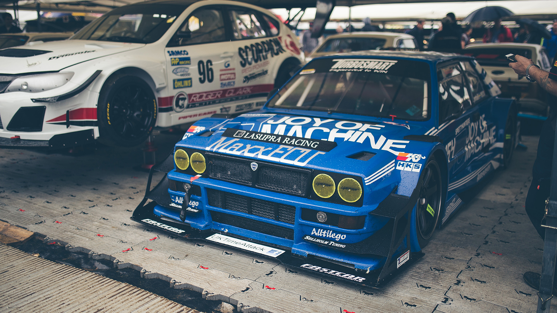 A Lancia touring car in the foreground (@fosgoodwood)