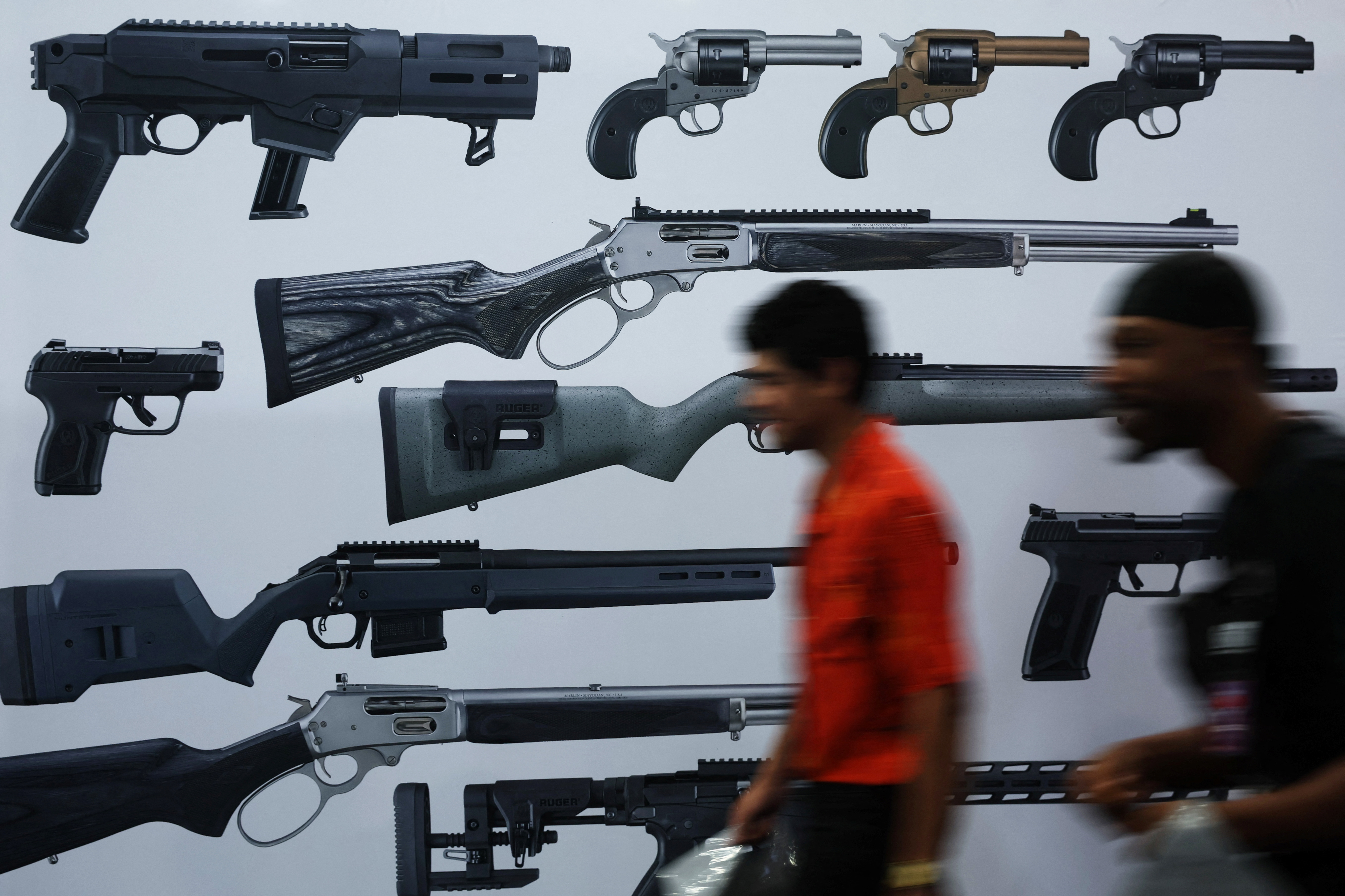 Asistentes a una convención de armas en Houston (REUTERS/Shannon Stapleton)