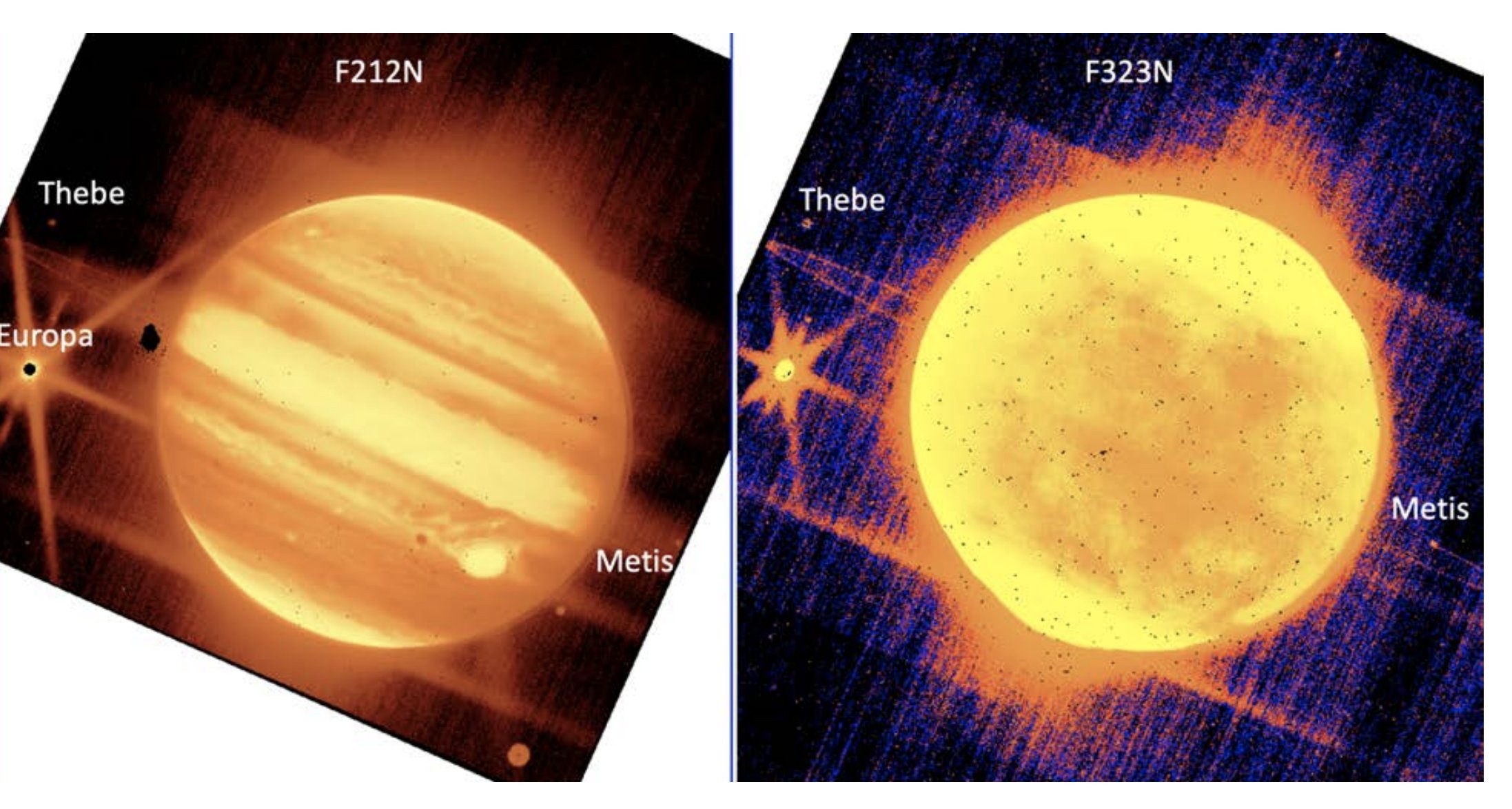 El gran planeta Júpiter aparece acompañado de un tenue anillo, así como de sus tres lunas: Metis, Teba y Europa (NASA)