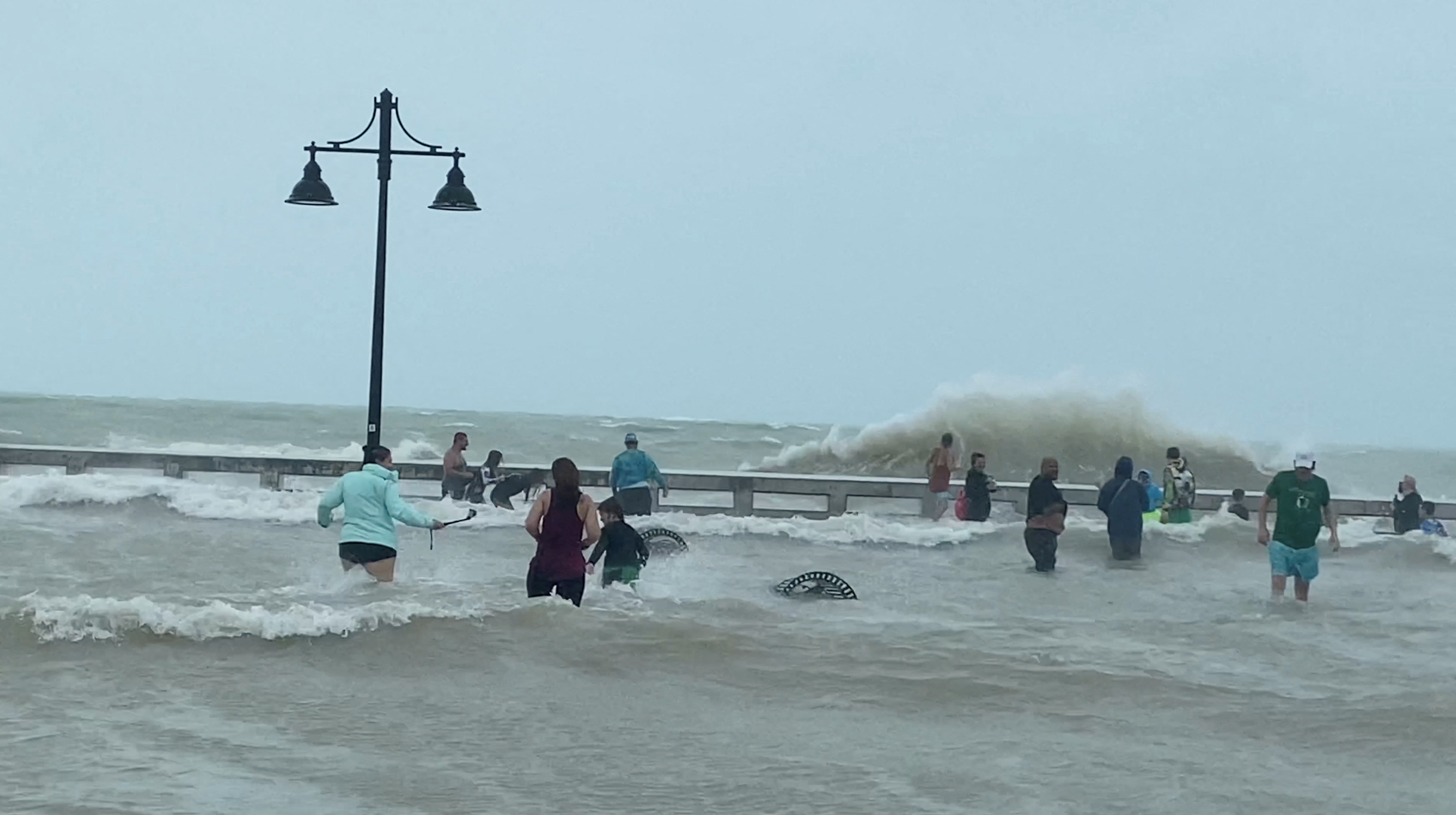 People gather at Key West pier as Hurricane Ian approaches