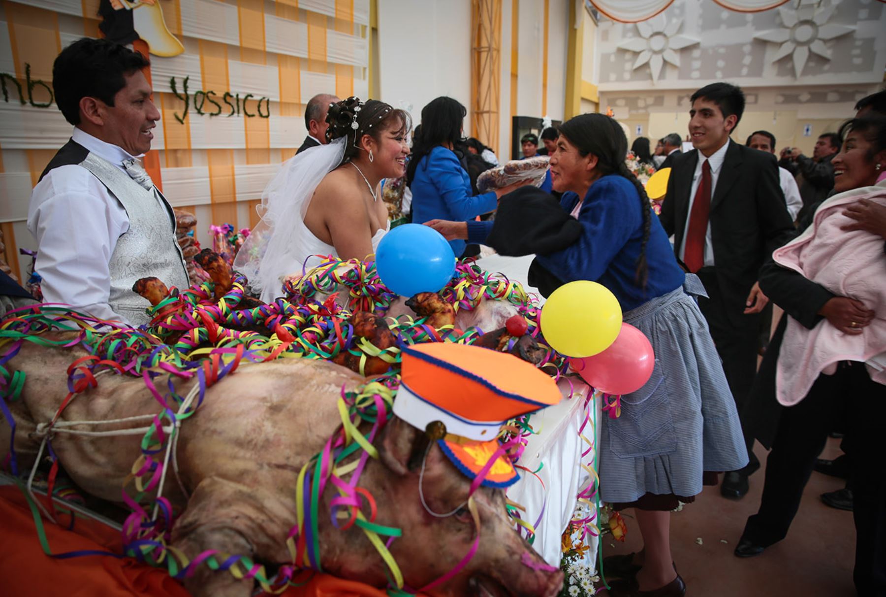 Newlyweds receive gifts as a symbol of abundance and prosperity.  (Andean)