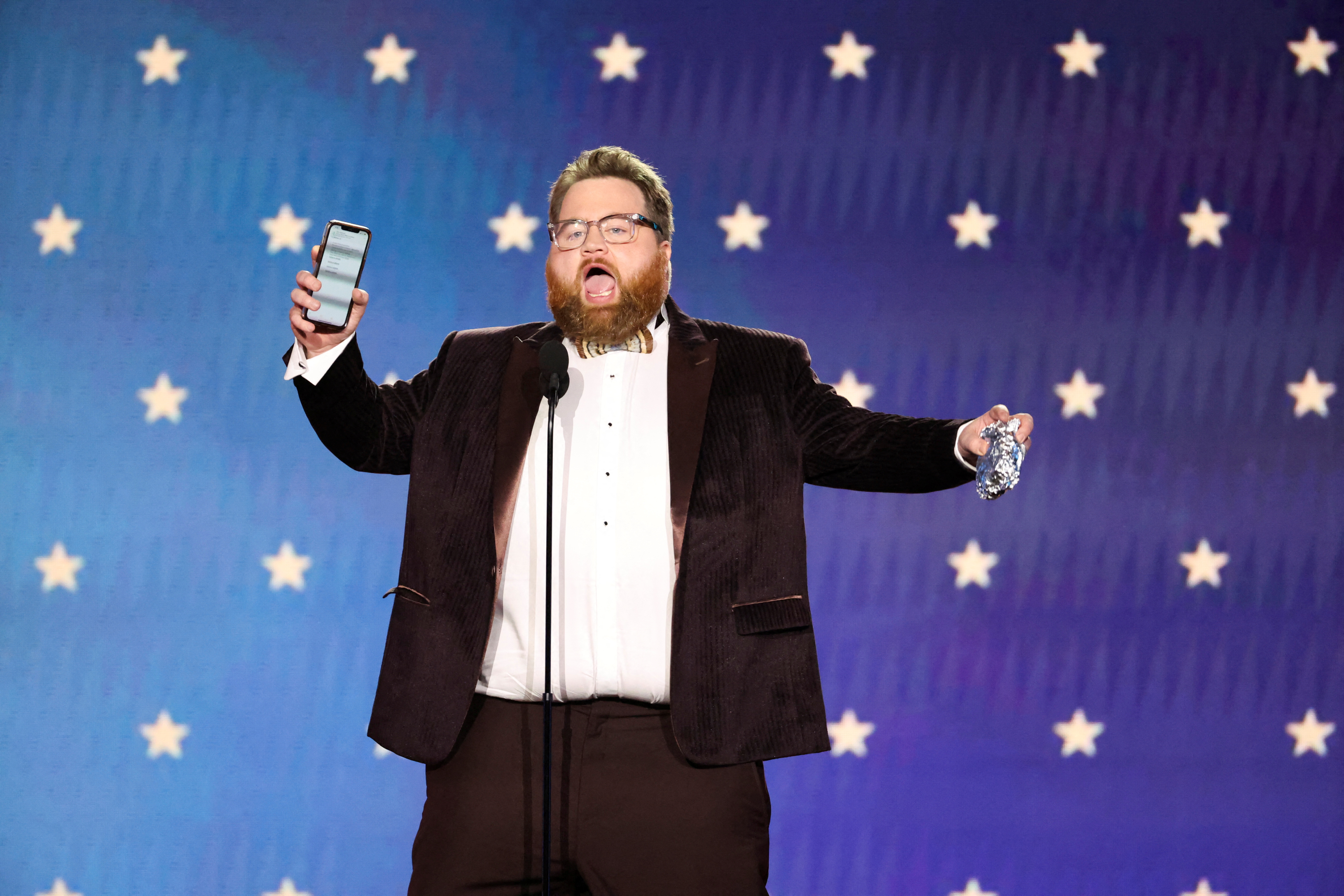 Paul Walter Hauser accepts the Best Supporting Actor in a Movie/Miniseries award for "Black Bird" during the 28th annual Critics Choice Awards in Los Angeles, California, U.S., January 15, 2023. REUTERS/Mario Anzuoni