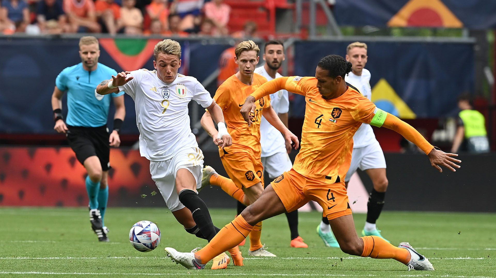 ENSCHEDE, NETHERLANDS - JUNE 18: Virgil van Dijk of Netherlands competes for the ball with Mateo Retegui of Italy during the UEFA Nations League 2022/23 third-place match between Netherlands and Italy at FC Twente Stadium on June 18, 2023 in Enschede, Netherlands. (Photo by Claudio Villa/Getty Images)