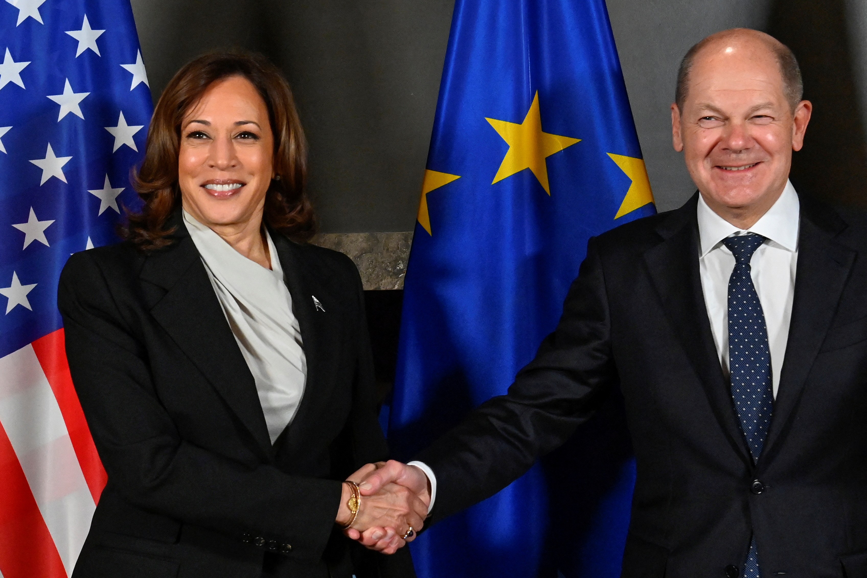 German Chancellor Olaf Scholz and US Vice President Kamala Harris shake hands during their bilateral meeting at the Munich Security Conference (MSC) in Munich, Germany.  Thomas Kienzle/Pool via REUTERS