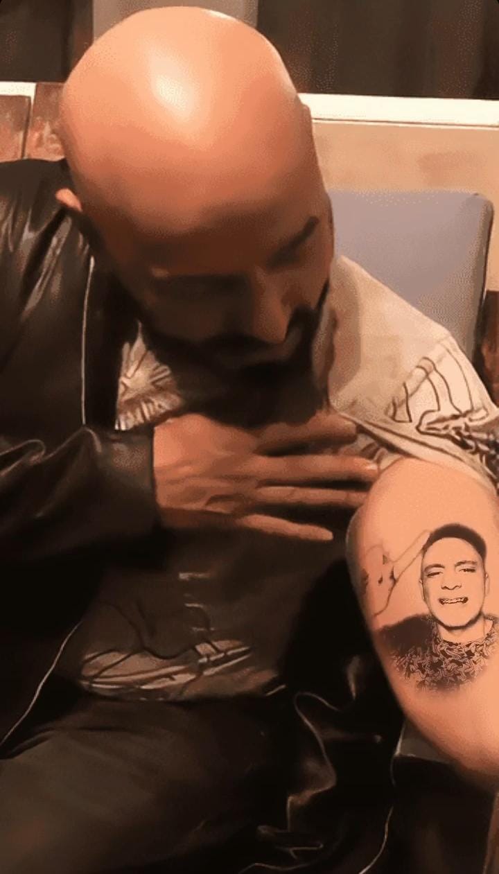 Tatuaje de Lupillo Rivera se volvió filtro; usuarios de redes pusieron sus  rostros en el brazo del cantante - Infobae