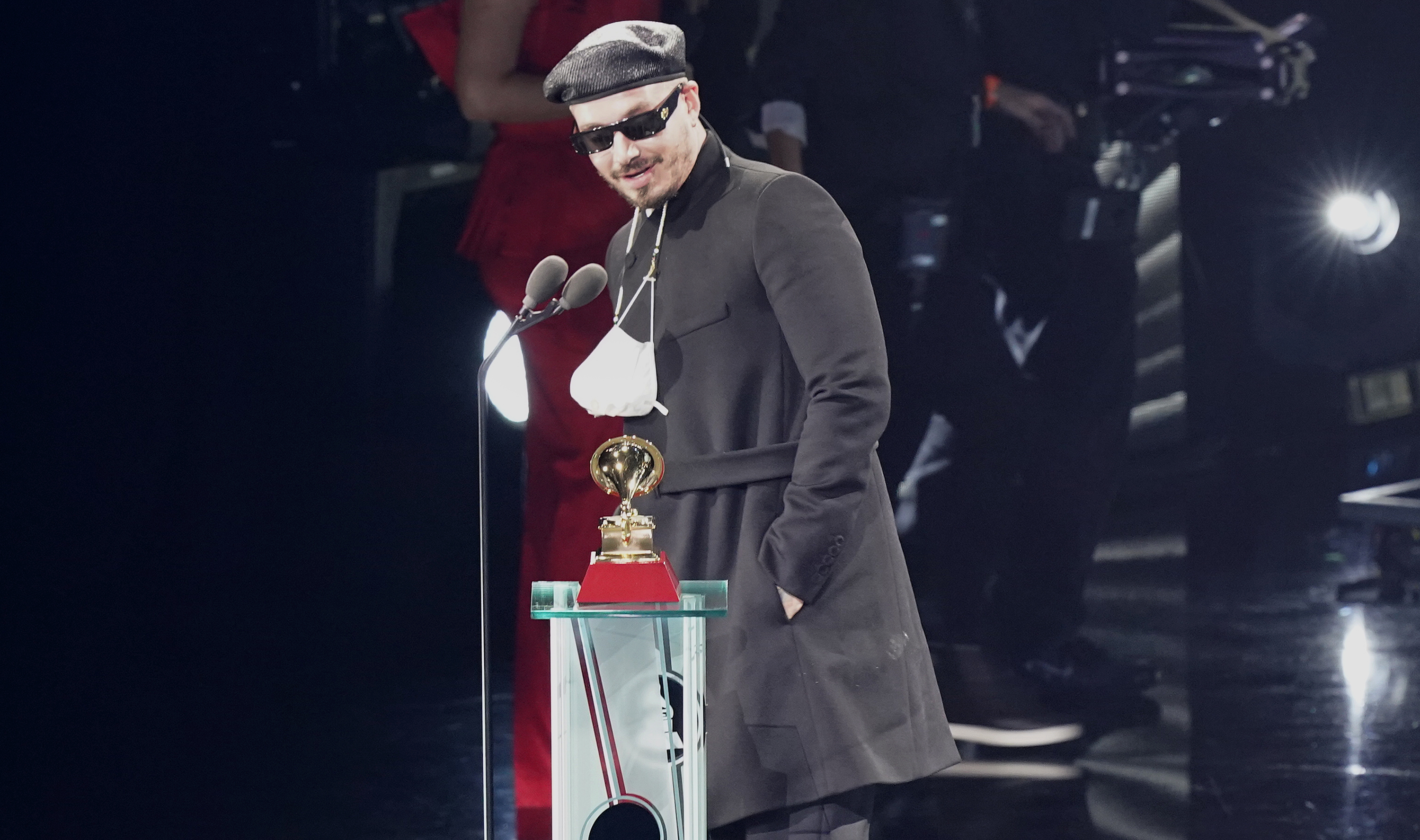 J Balvin accepts the award for best urban music album for "Colores" at the 21st Latin Grammy Awards, airing on Thursday, Nov. 19, 2020, at American Airlines Arena in Miami. (AP Photo/Marta Lavandier)