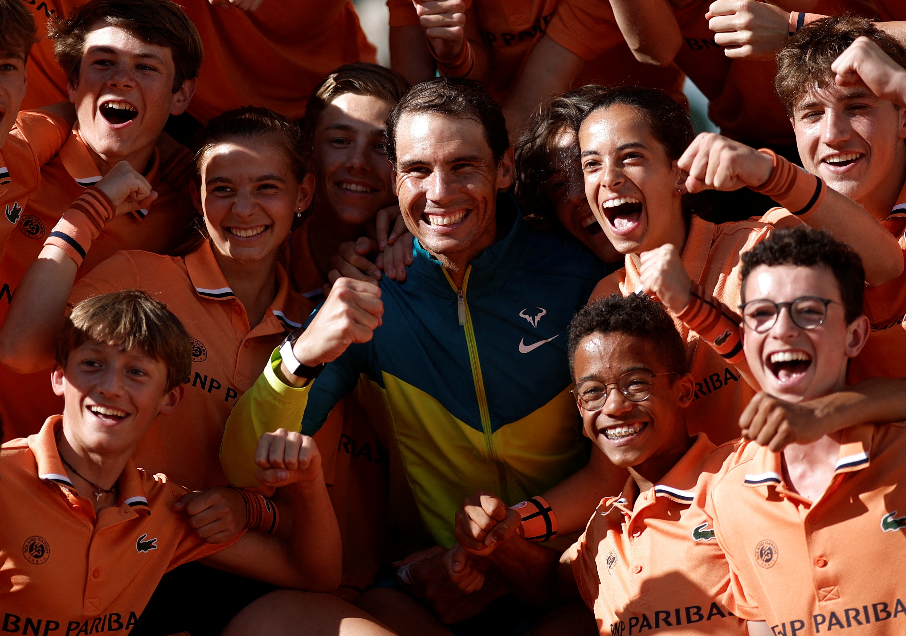 Tennis - French Open - Roland Garros, Paris, France - June 5, 2022 Spain's Rafael Nadal celebrates with the ball kids after winning the men's singles final against Norway's Casper Ruud REUTERS/Benoit Tessier     TPX IMAGES OF THE DAY