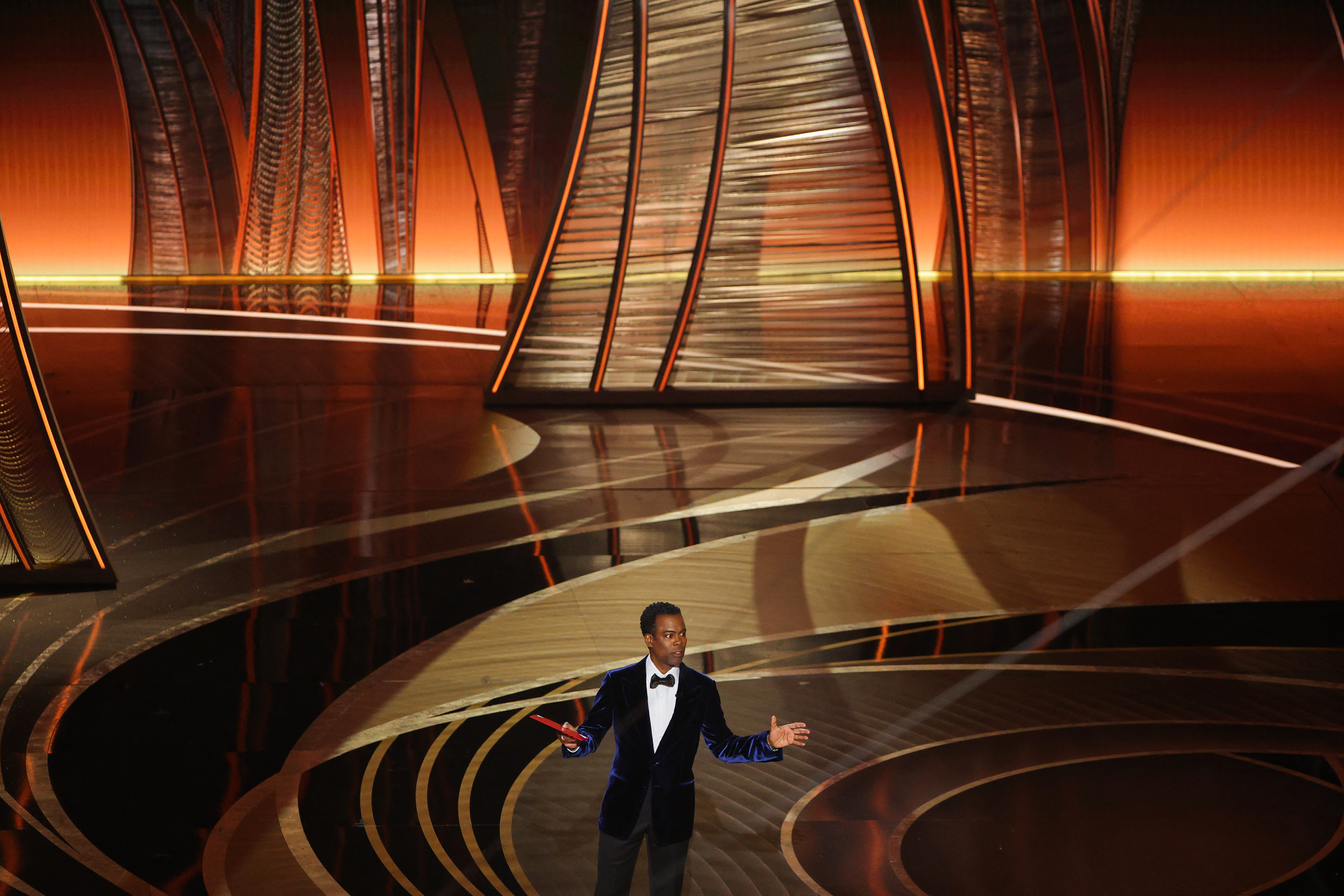 Chris Rock speaks to the audience at the 94th Academy Awards in Beverly Hills, California, U.S., March 27, 2022. REUTERS/Brian Snyder