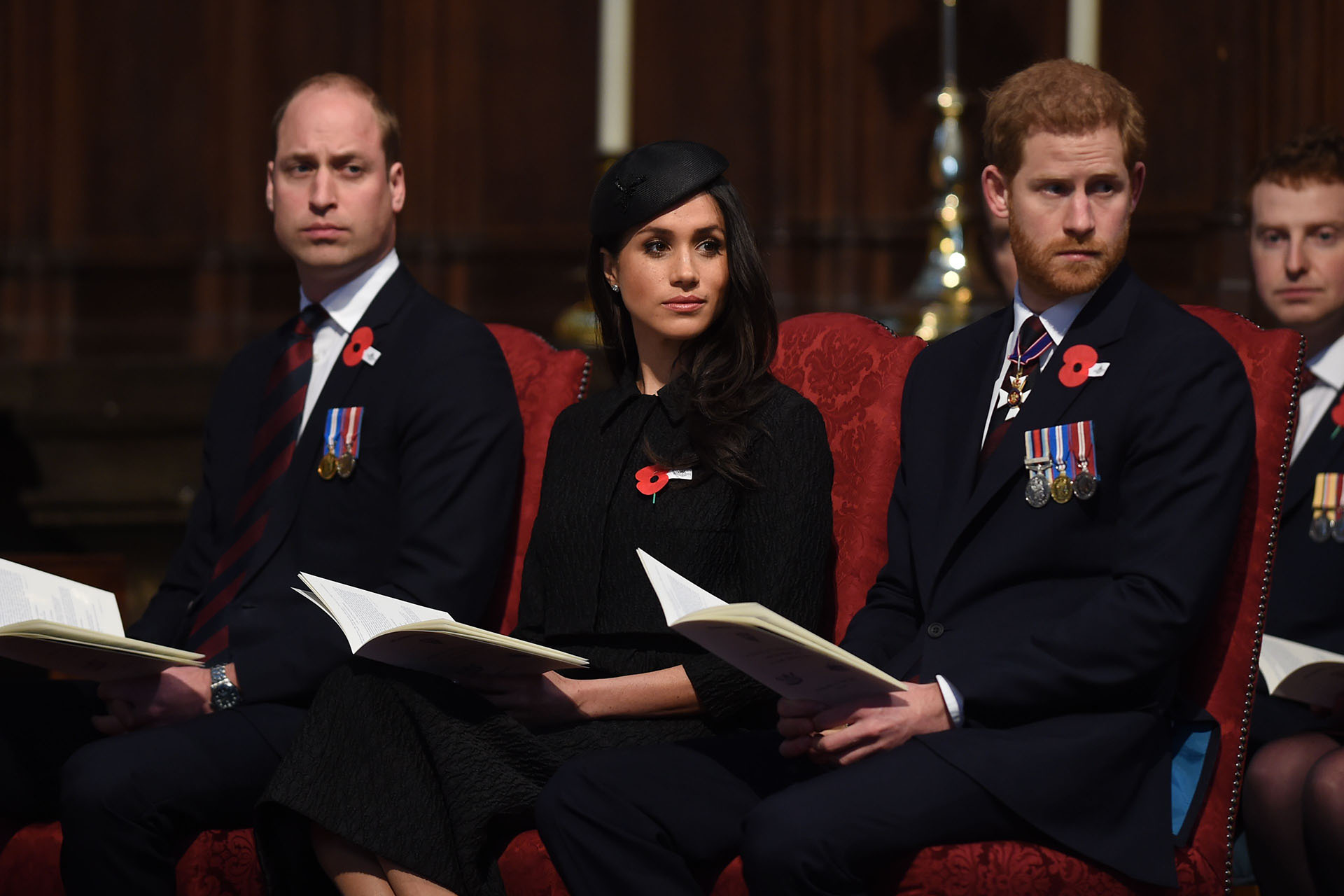 El príncipe William junto a Meghan Markle y el príncipe Harry (Shutterstock)