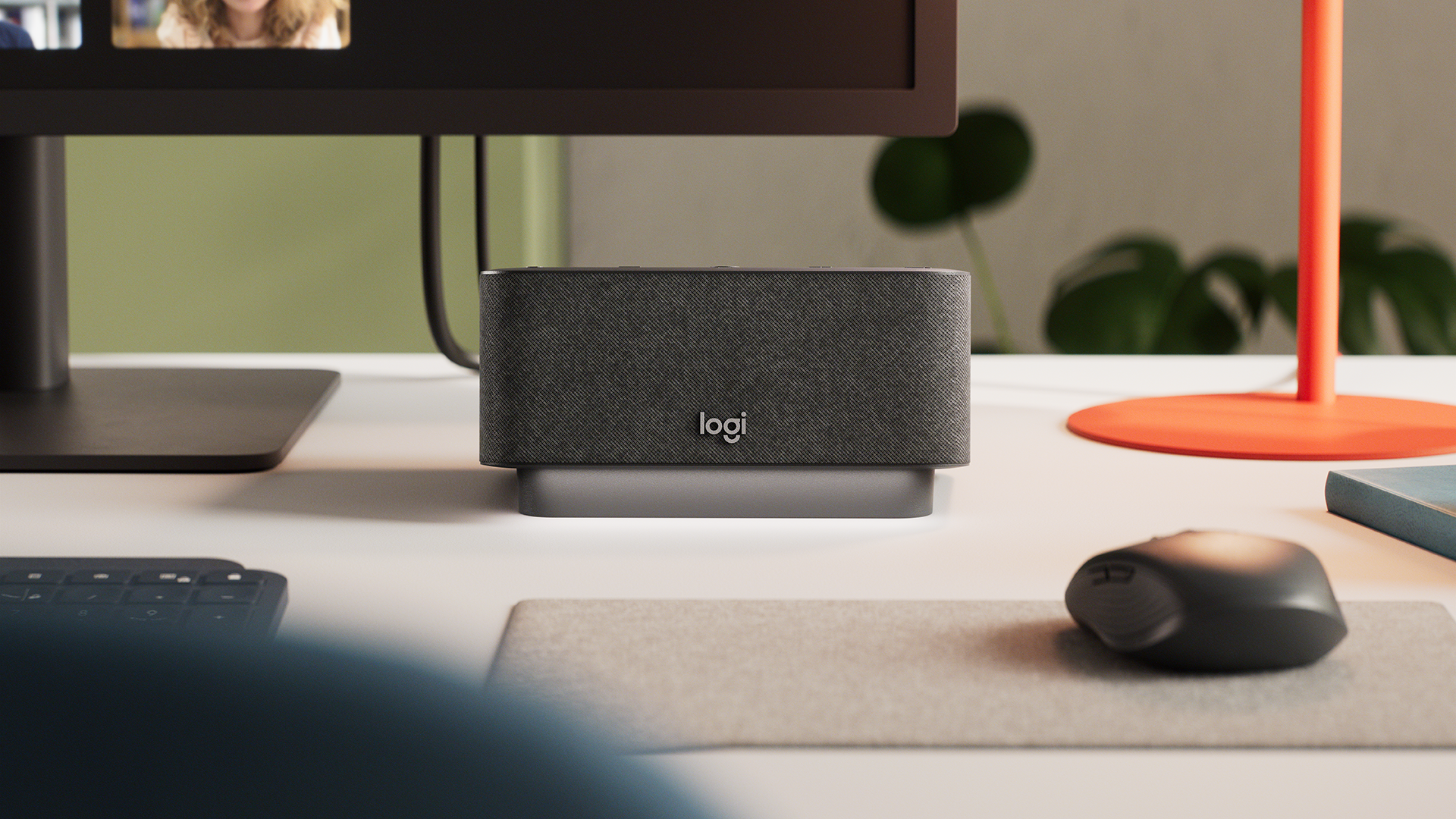 The noise cancellation function prevents annoying ambient noise, while touching the main button of the Logi Dock the user can instantly connect to video conferences (Credit: Logitech Press)