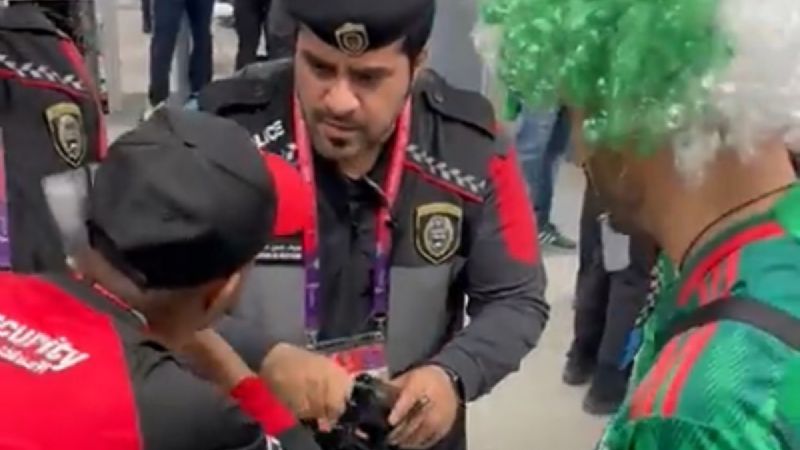 A Mexican fan tried to sneak alcohol into a stadium but was caught (Screenshot: Alan Estrada/Twitter)