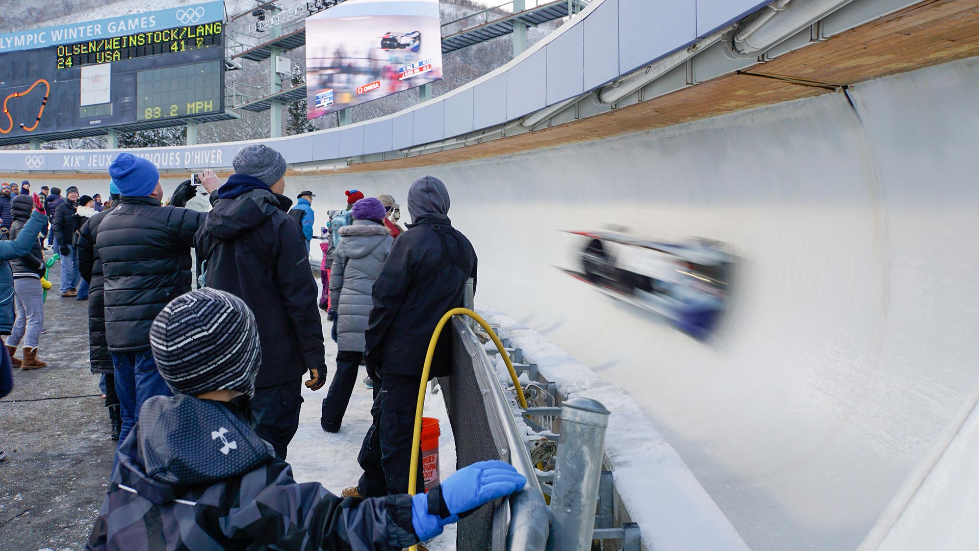 A USA bobsled speeds through the Olympic curve at Utah Olympic Park during a World Cup race (Utah Olympic Legacy Foundation)