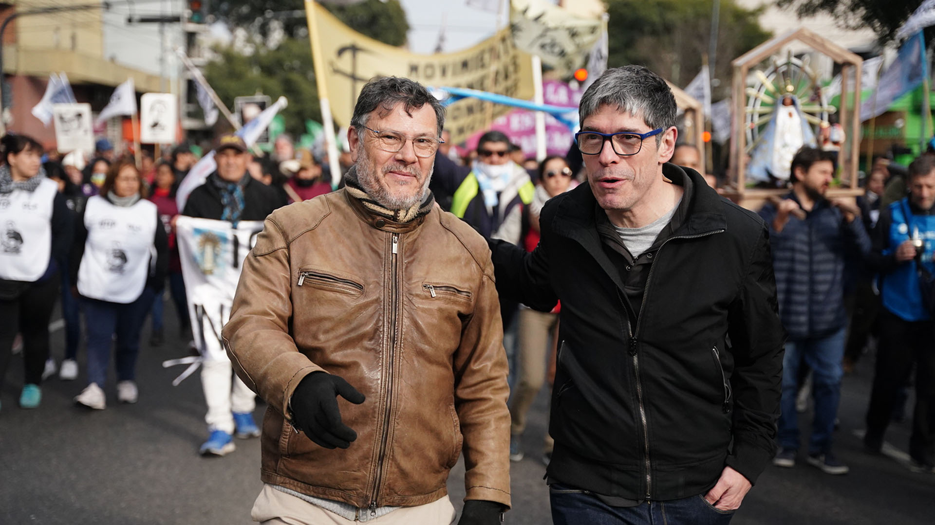 Juan Manuel Abal Medina, former head of the Cabinet of Ministers of Argentina (right) joined the social demonstration