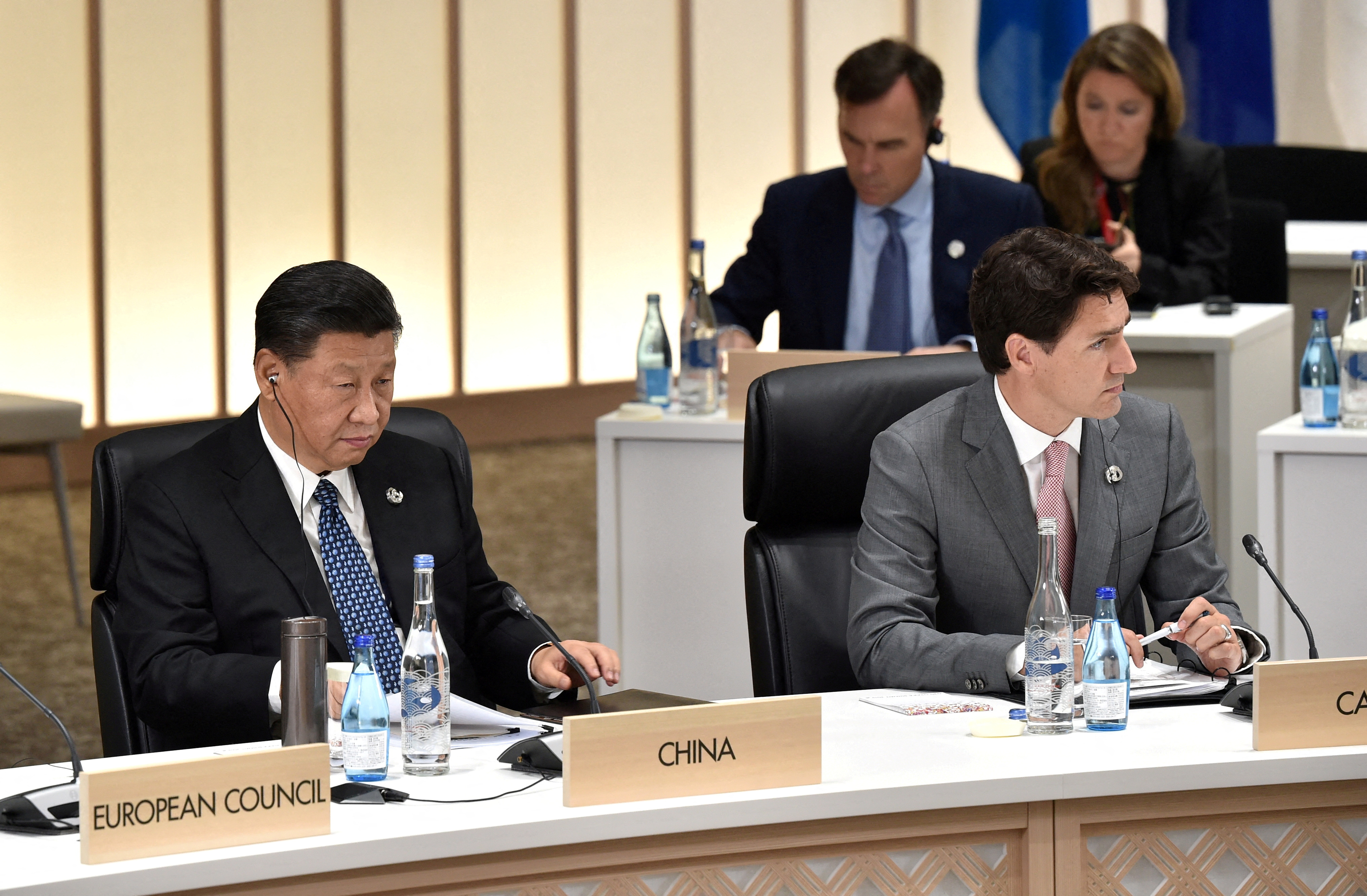 Xi Jinping junto a Trudeau en una cumbre del G20 (Kazuhiro Nogi/REUTERS)