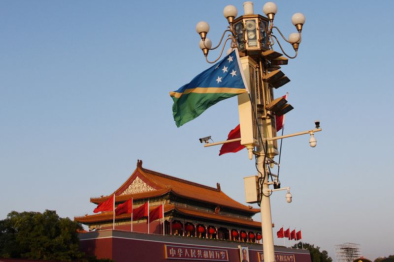 From the files: The national flags of the Solomon Islands and China fly in Tiananmen Square in Beijing (Reuters)
