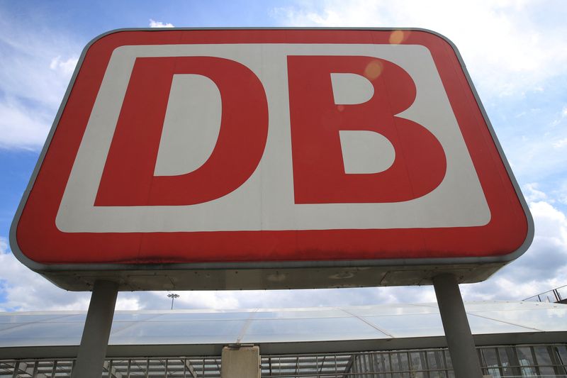 FILE PHOTO: A logo of German railways Deutsche Bahn is displayed outside the Cologne-Bonn Airport train station in Cologne.  July 28, 2020. REUTERS/Wolfgang Rattay/