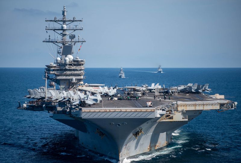 FILE PHOTO - South Korean and US Navy ships, including the aircraft carrier USS Ronald Reagan, take part in a joint naval exercise off the coast of South Korea, in this photo provided by the South Korean Navy. and broadcast by Yonhap.  September 29, 2022. South Korean Navy/Yonhap via REUTERS