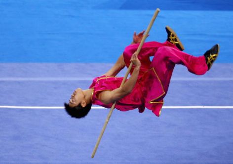 BEIJING - AUGUST 28:  Hsu Kai-Kuei of Taiwan competes in men's Wushu nan gun on day one of the Sportaccord Combat Games 2010 at the Olympic Centre Gymnasium on August 28, 2010 in Beijing, China. Scheduled from 28 August to 4 September 2010, the first Combat Games 2010 feature 13 martial arts and combat sports, both Olympic and non-Olympic.  (Photo by Feng Li/Getty Images)