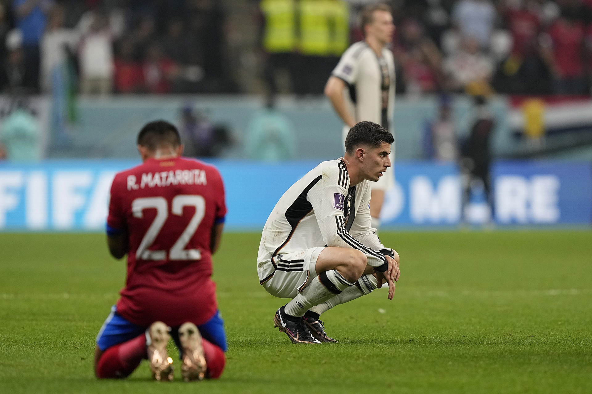 Germany's Kai Havertz, centre, reacts after the World Cup group E soccer match between Costa Rica and Germany at the Al Bayt Stadium in Al Khor , Qatar, Thursday, Dec. 1, 2022. (AP Photo/Martin Meissner)