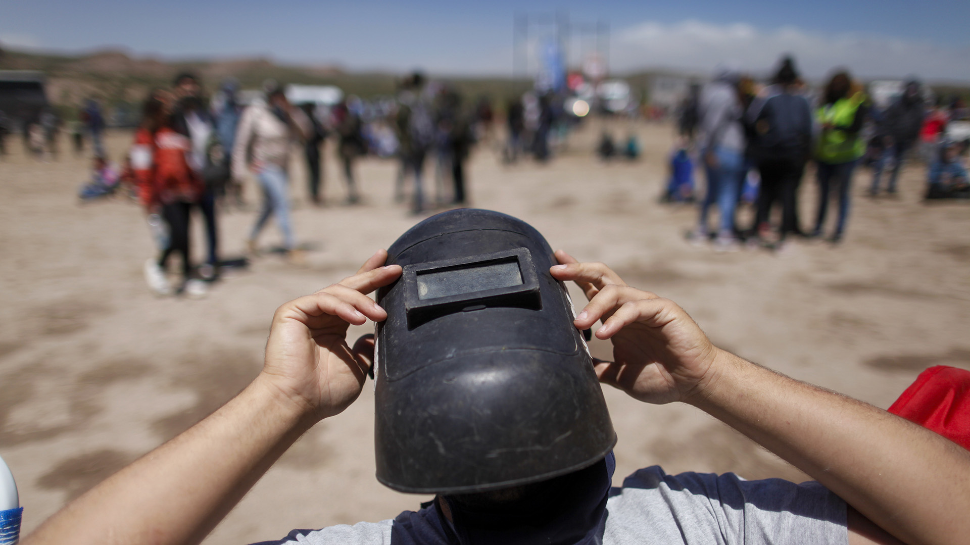 A safe option is to use a grade 12 or higher welding helmet lens (AP Photo/Natacha Pisarenko)