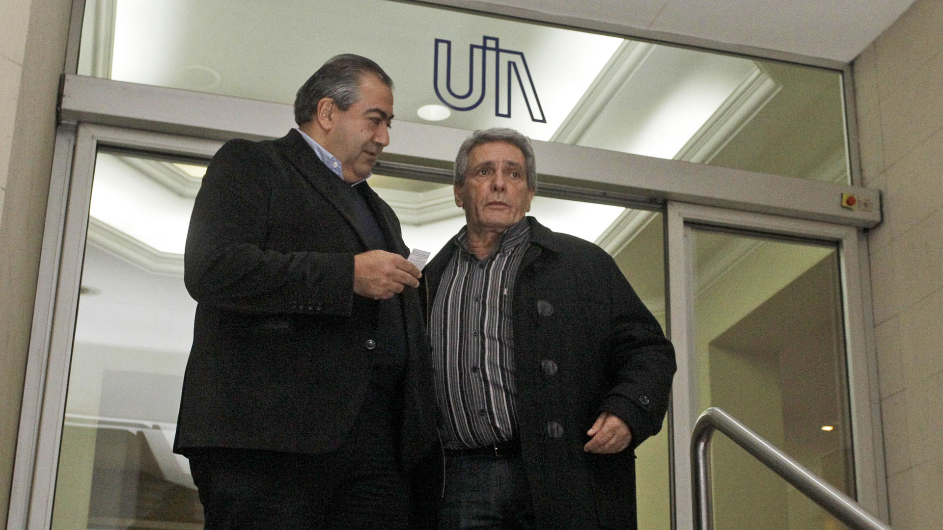 Héctor Daer y Carlos Acuña, tras una reunión en la sede de la UIA